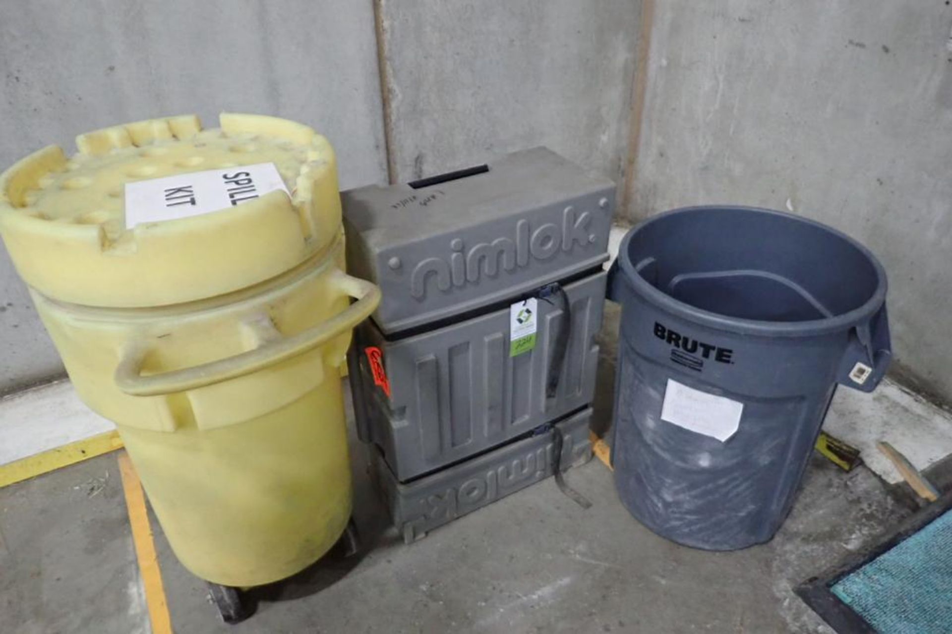 Portable spill kit container, Nimlok trade show display, brute trash bin. **Rigging Fee: $25** (Loca