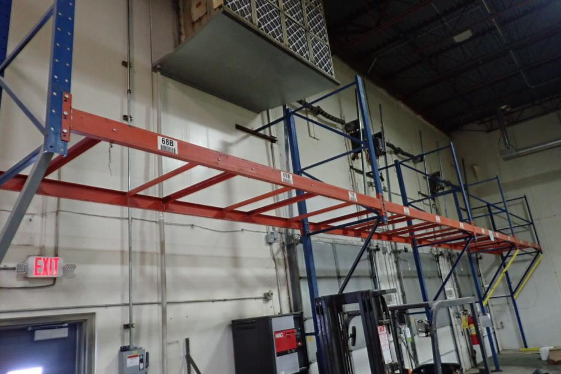 (6) bays wall mount pallet rack above shipping doors, 12 ft. wide, 16 ft. tall.. **Rigging Fee: $300 - Image 3 of 3