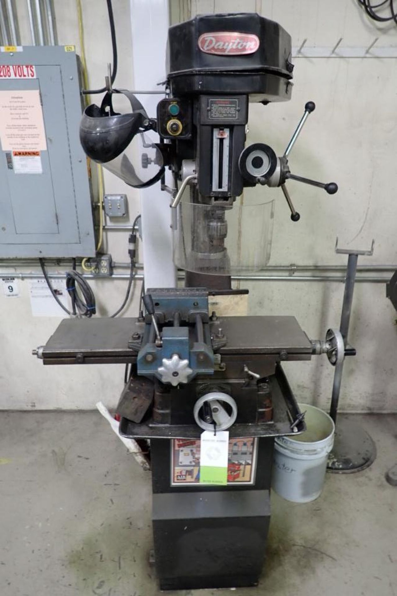 Dayton drill/mill Model 2AC40, with mill vise.. **Rigging Fee: $250** (Located in Brooklyn Park, MN.