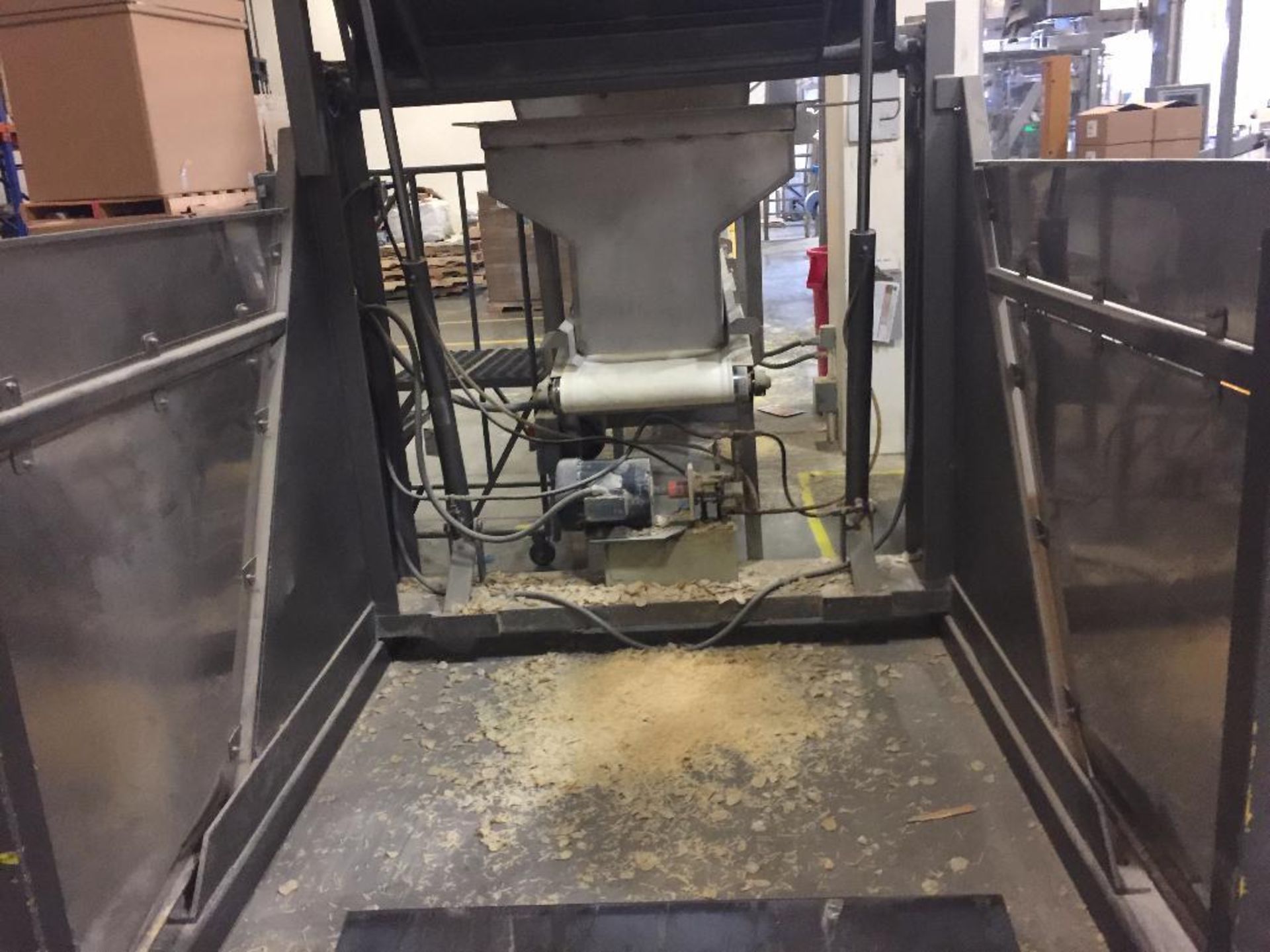 SS tote dump, 68 in. pivot height, motor and hydraulic pump. **Rigging Fee: $250 ** (Located in Keno - Image 2 of 3