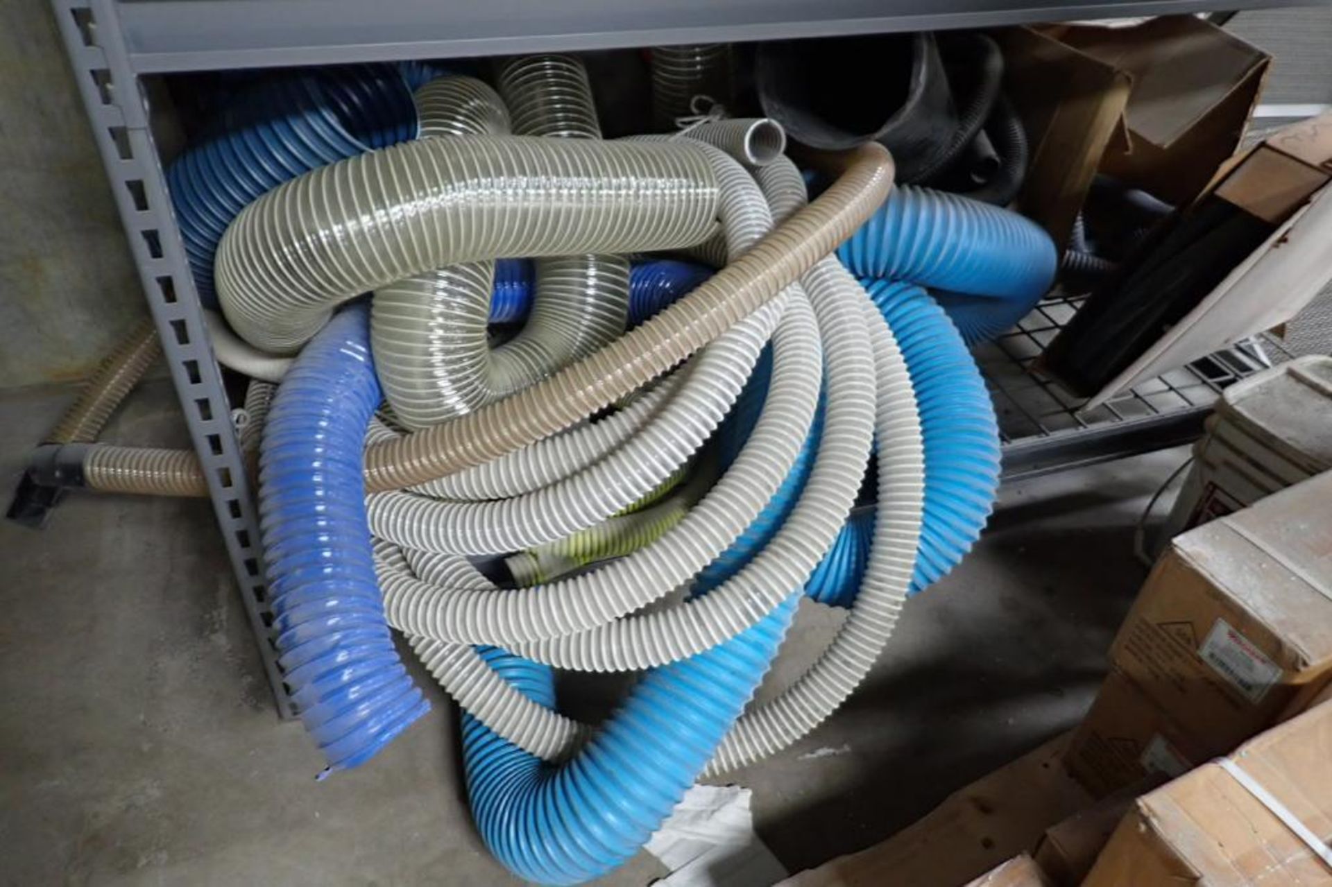 Contents of shelving, hose, drip diverter. **Rigging Fee: $100** (Located in Brooklyn Park, MN.) - Image 2 of 4