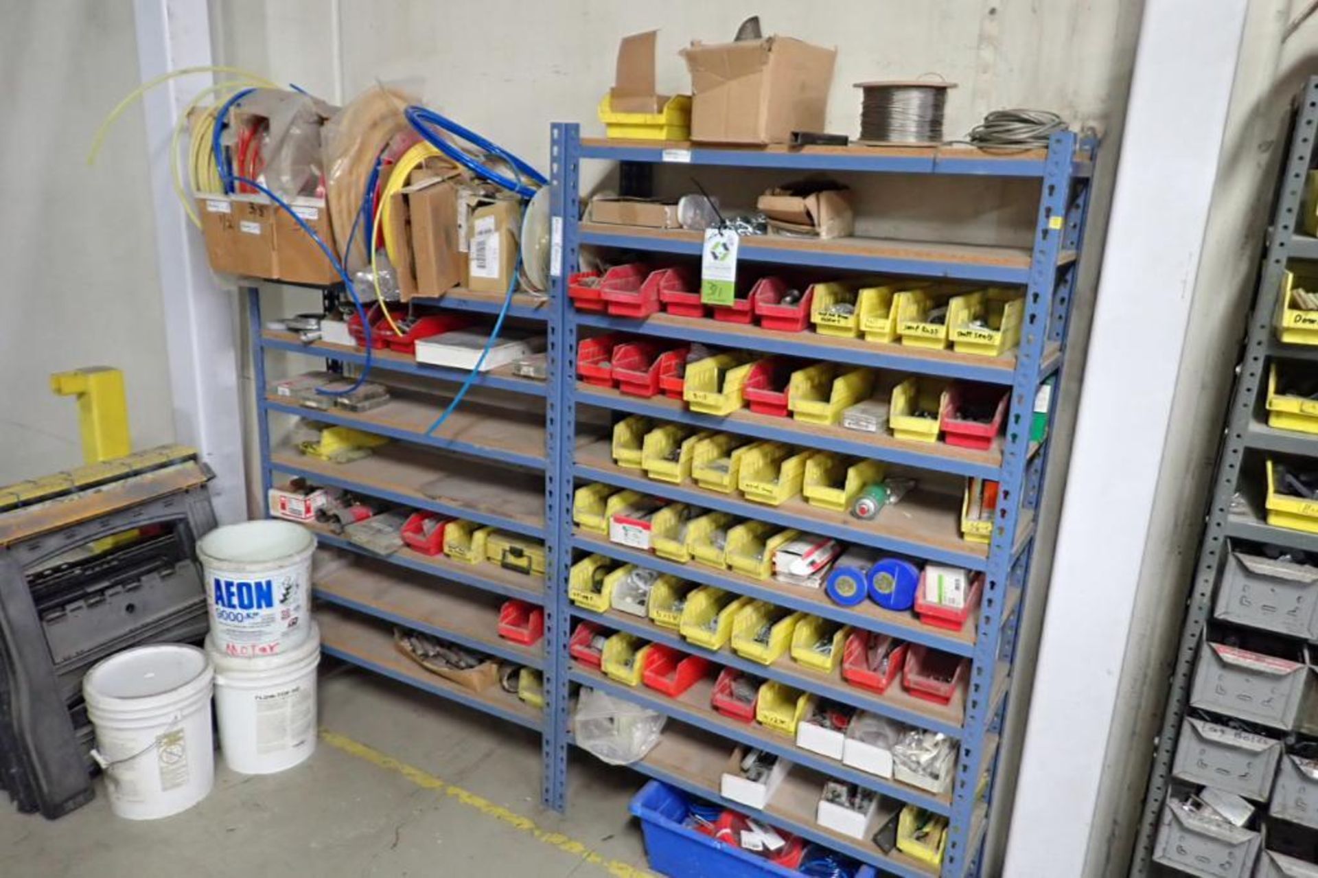 Contents of 2 sections of shelves, air line, tubing, air fittings. **Rigging Fee: $50** (Located in