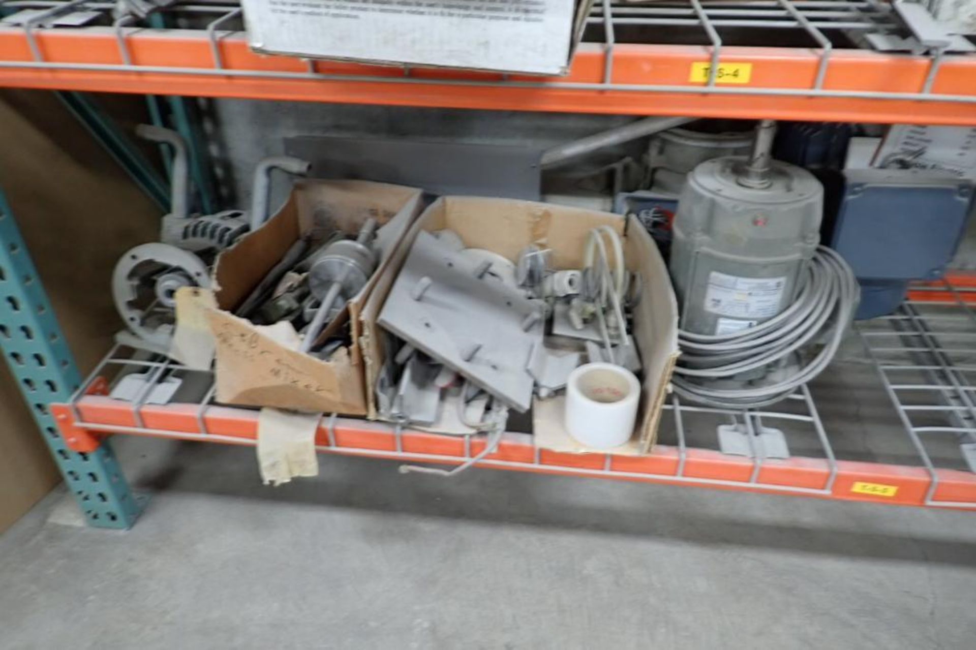 Contents of 8 ft. of shelves, motors, speed reducers, gearboxes, conveyor belts. **Rigging Fee: $275 - Image 2 of 11