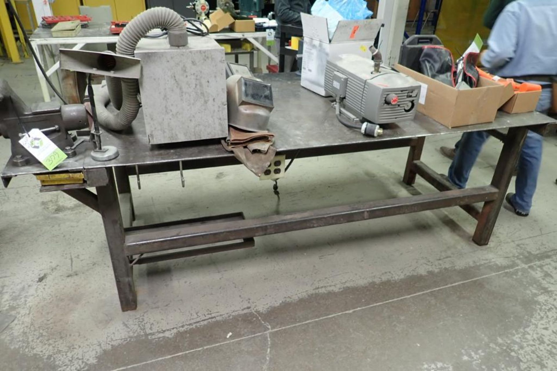Steel work bench with vice, 8 in. jaw, 90 in. long x 48 in. wide x 36 in. tall. **Rigging Fee: $50**