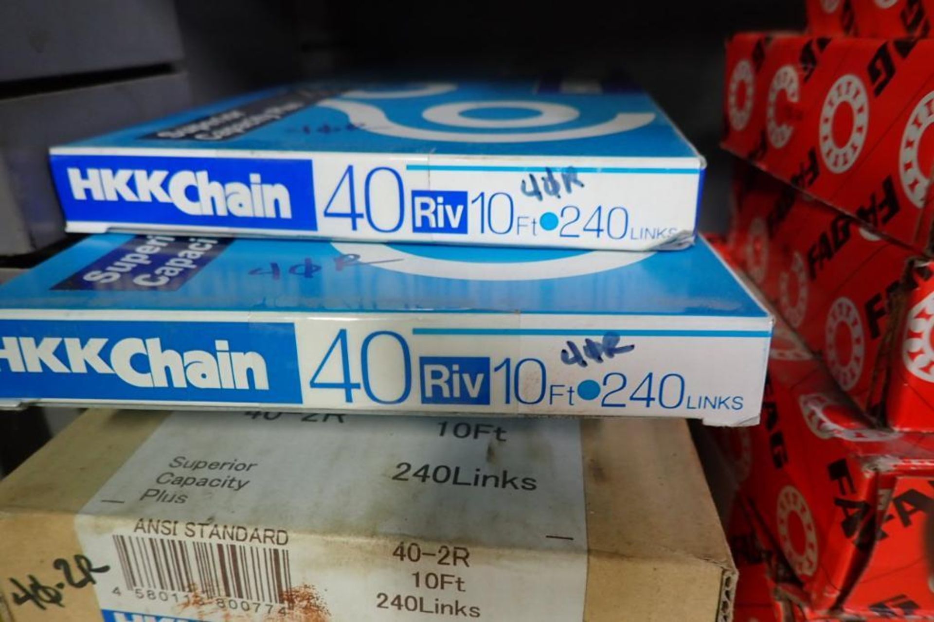 Roller chain, chain parts, contents of 2 sections of shelves. **Rigging Fee: $100** (Located in Broo - Image 16 of 20