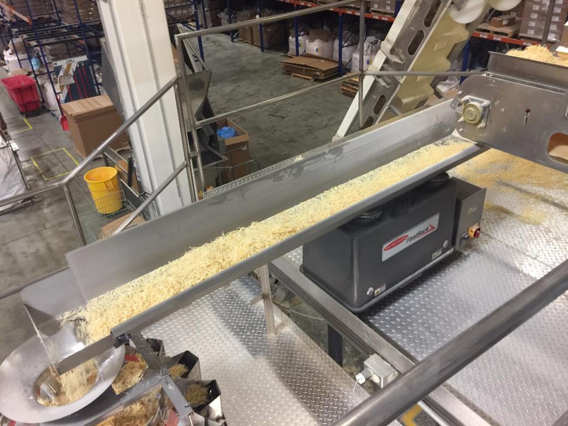 Heat and Control Fast Back vibratory conveyor to scale, 96 in. x 12 in. **Rigging Fee: $250 ** (Loca