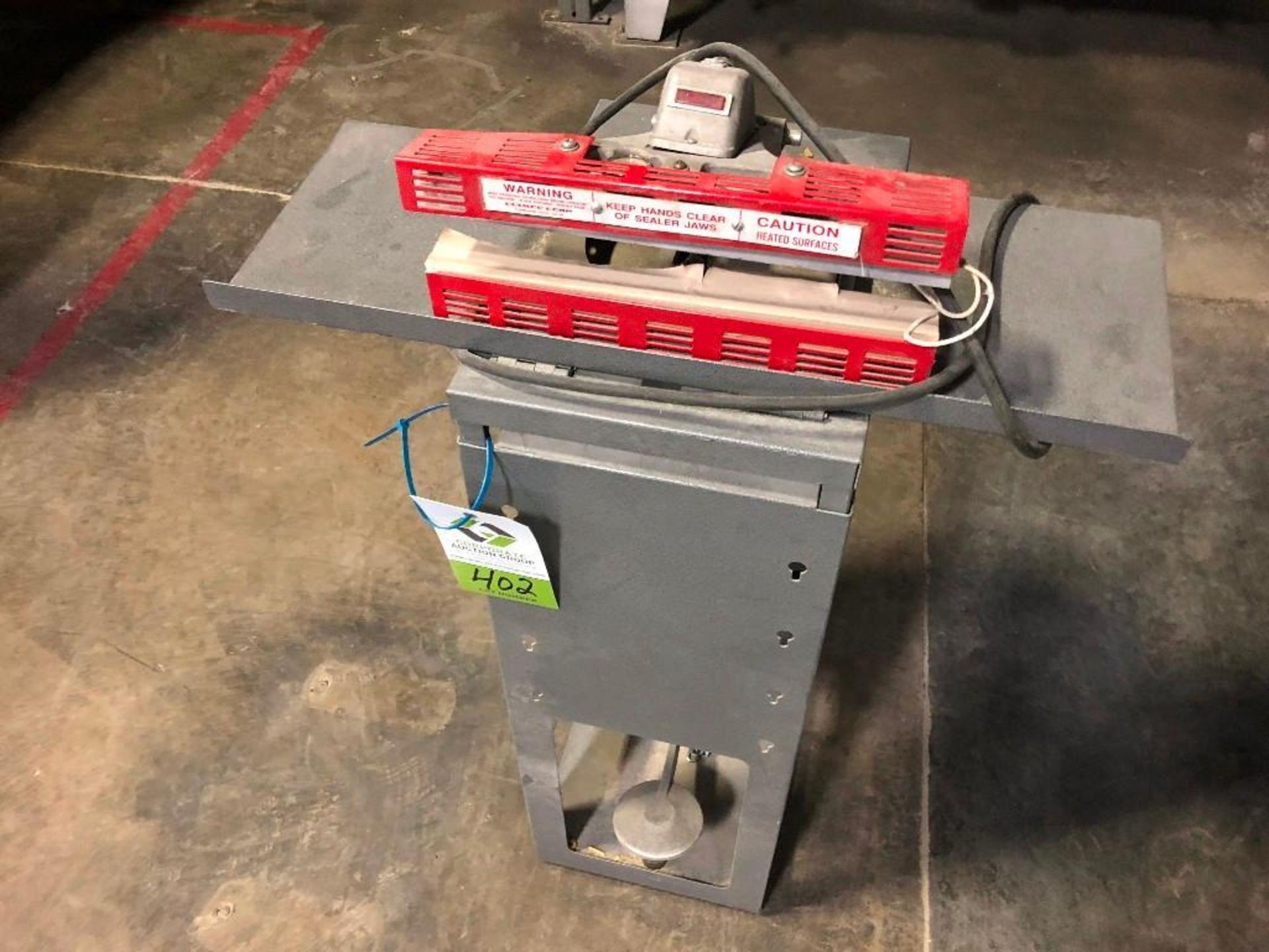 Clamco foot powered impulse sealer, 12 in. seal bar. **Rigging Fee: $50** (Located in Brooklyn Park,