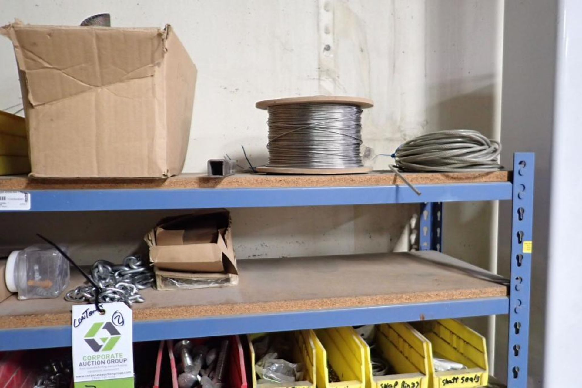 Contents of 2 sections of shelves, air line, tubing, air fittings. **Rigging Fee: $50** (Located in - Image 5 of 9