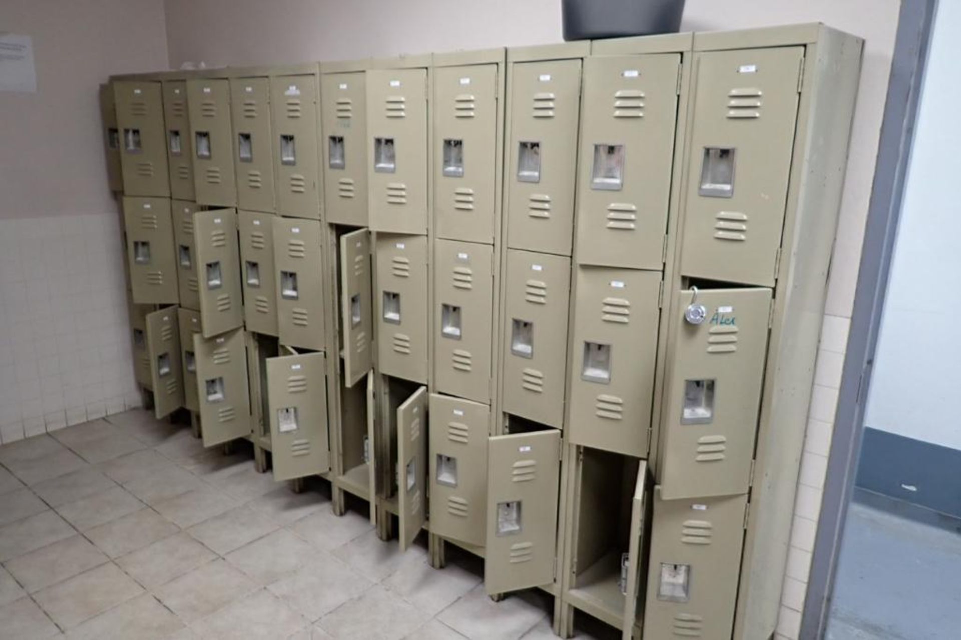 Employee lockers, (8) sections of 9 lockers, 10 in. wide x 14 in. deep x 23 in. tall per locker. **R - Image 4 of 4