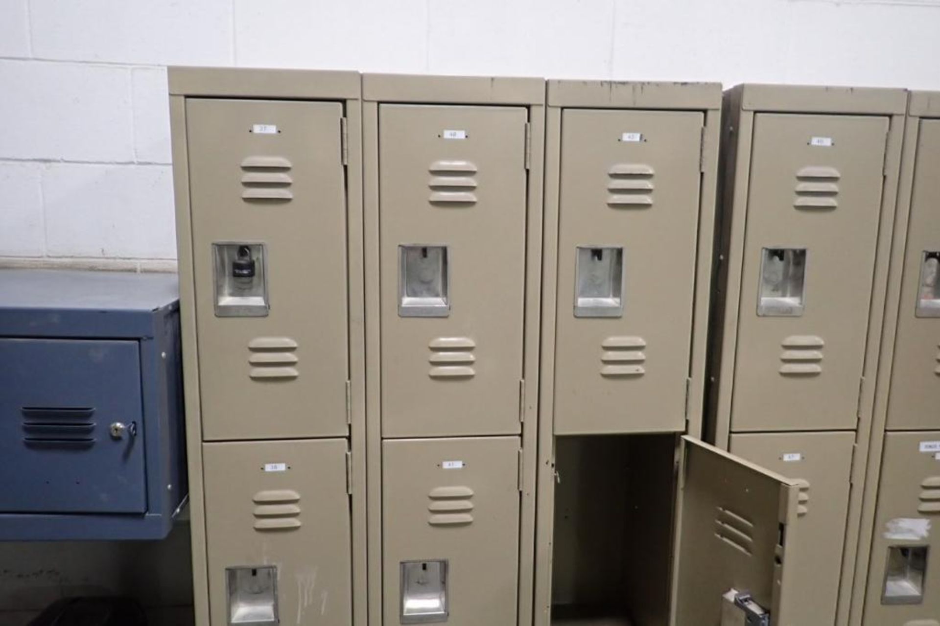 Employee lockers, (8) sections of 9 lockers, 10 in. wide x 14 in. deep x 23 in. tall per locker. **R - Image 2 of 4