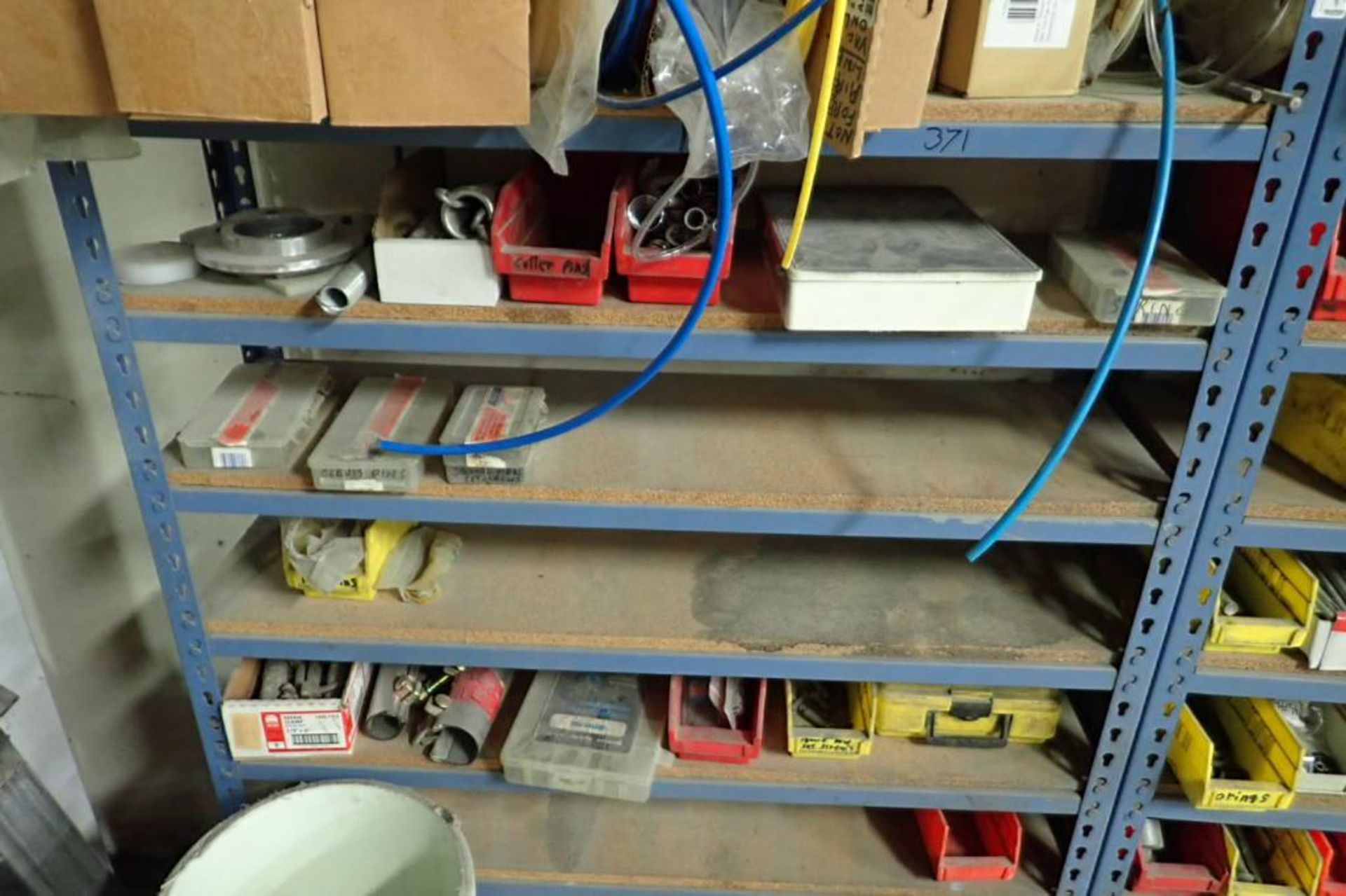 Contents of 2 sections of shelves, air line, tubing, air fittings. **Rigging Fee: $50** (Located in - Image 8 of 9