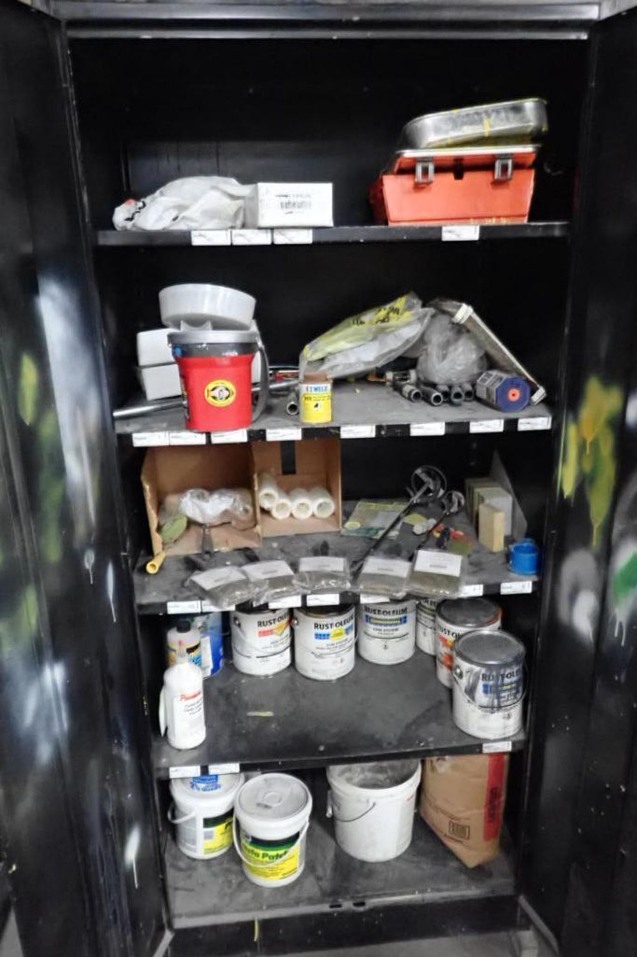 2-door cabinet with contents, paint supplies, brushes, rollers, paint pans. **Rigging Fee: $100** (L - Image 2 of 4