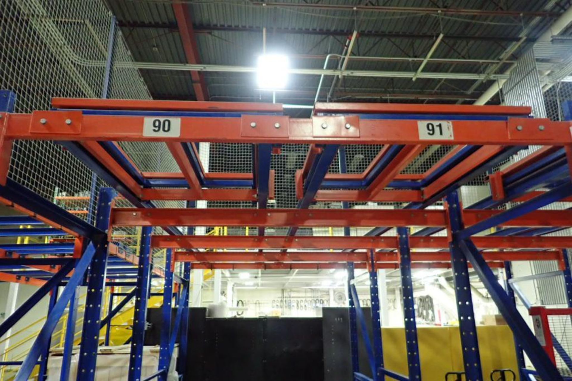 (2) bays push back rack, 4 deep, 112 in. tall, 32 pallet positions, with safety nets. **Rigging Fee: - Image 2 of 4