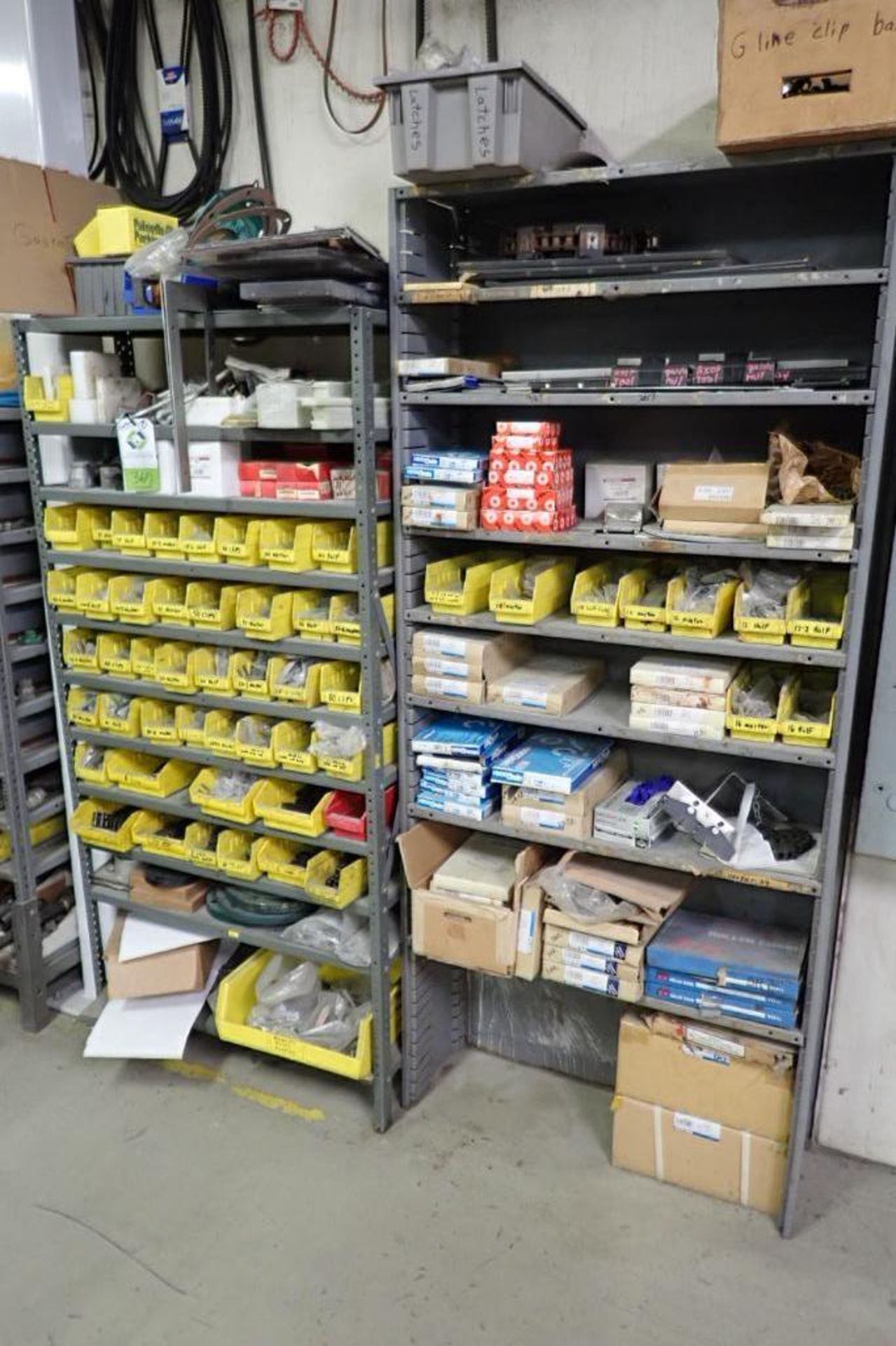 Roller chain, chain parts, contents of 2 sections of shelves. **Rigging Fee: $100** (Located in Broo