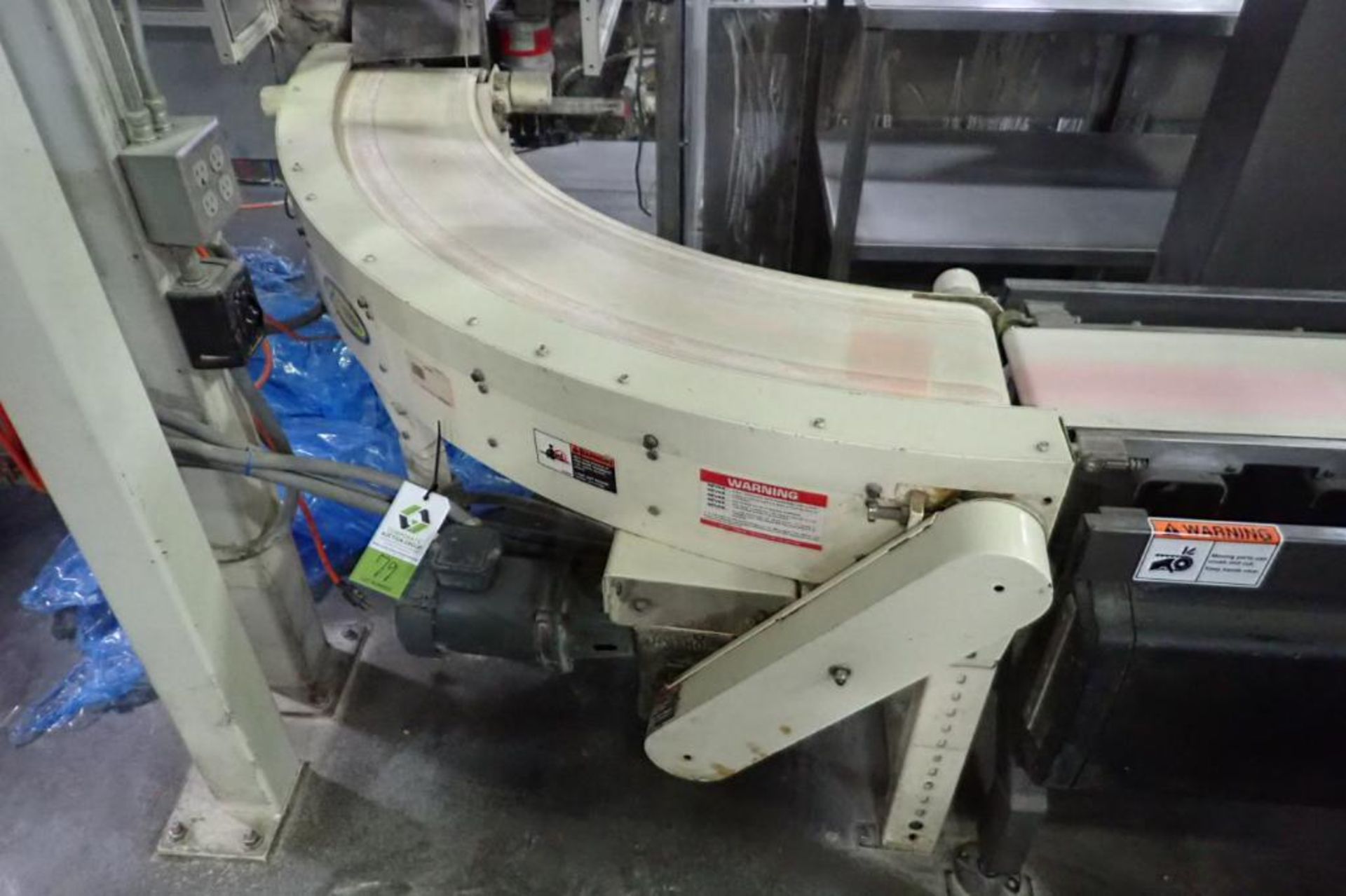 Hytrol 90 degree belt conveyor, 60 in. long x 10 in. wide, mild steel frame, motor and drive. **Rigg