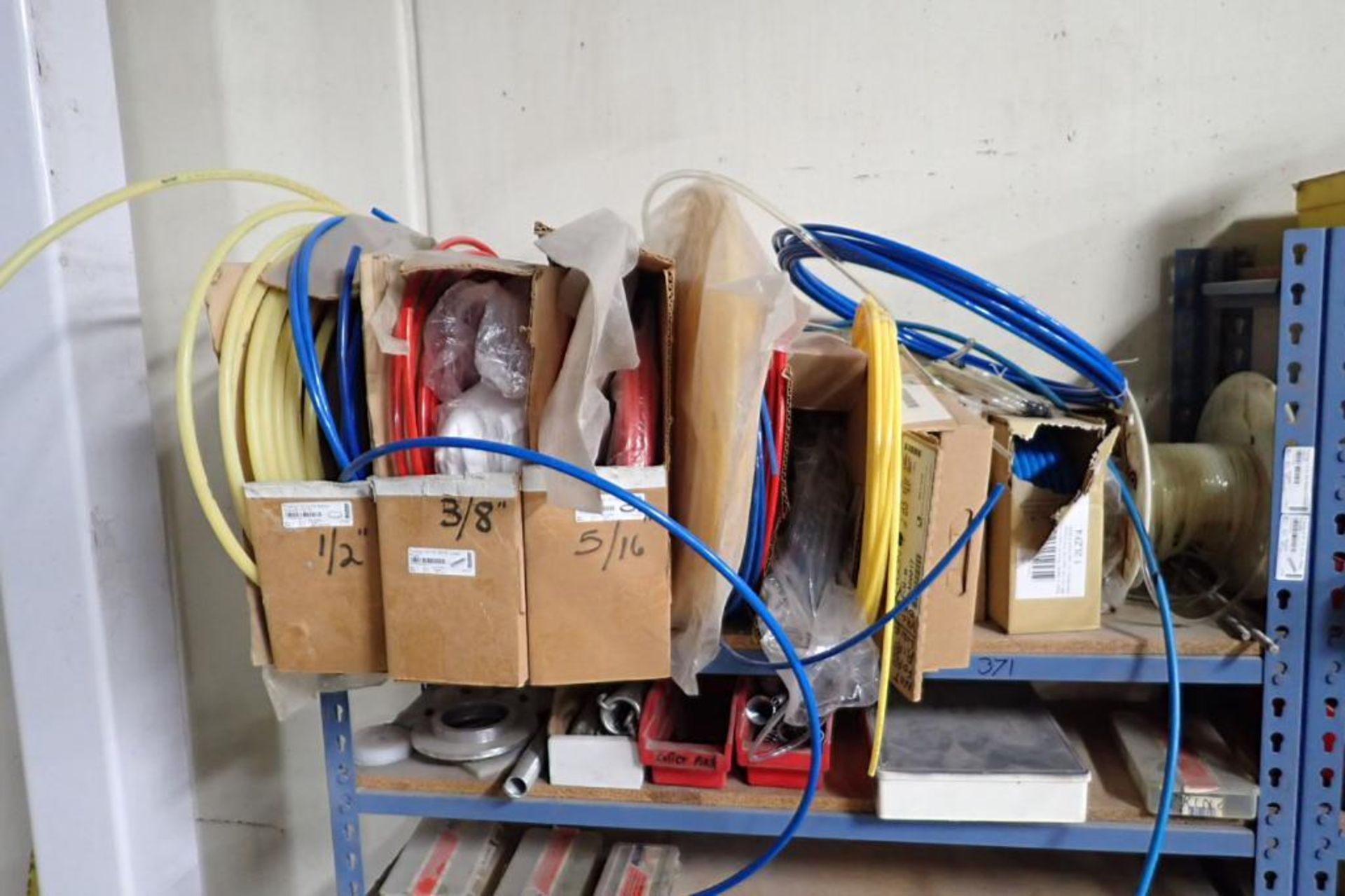 Contents of 2 sections of shelves, air line, tubing, air fittings. **Rigging Fee: $50** (Located in - Image 7 of 9