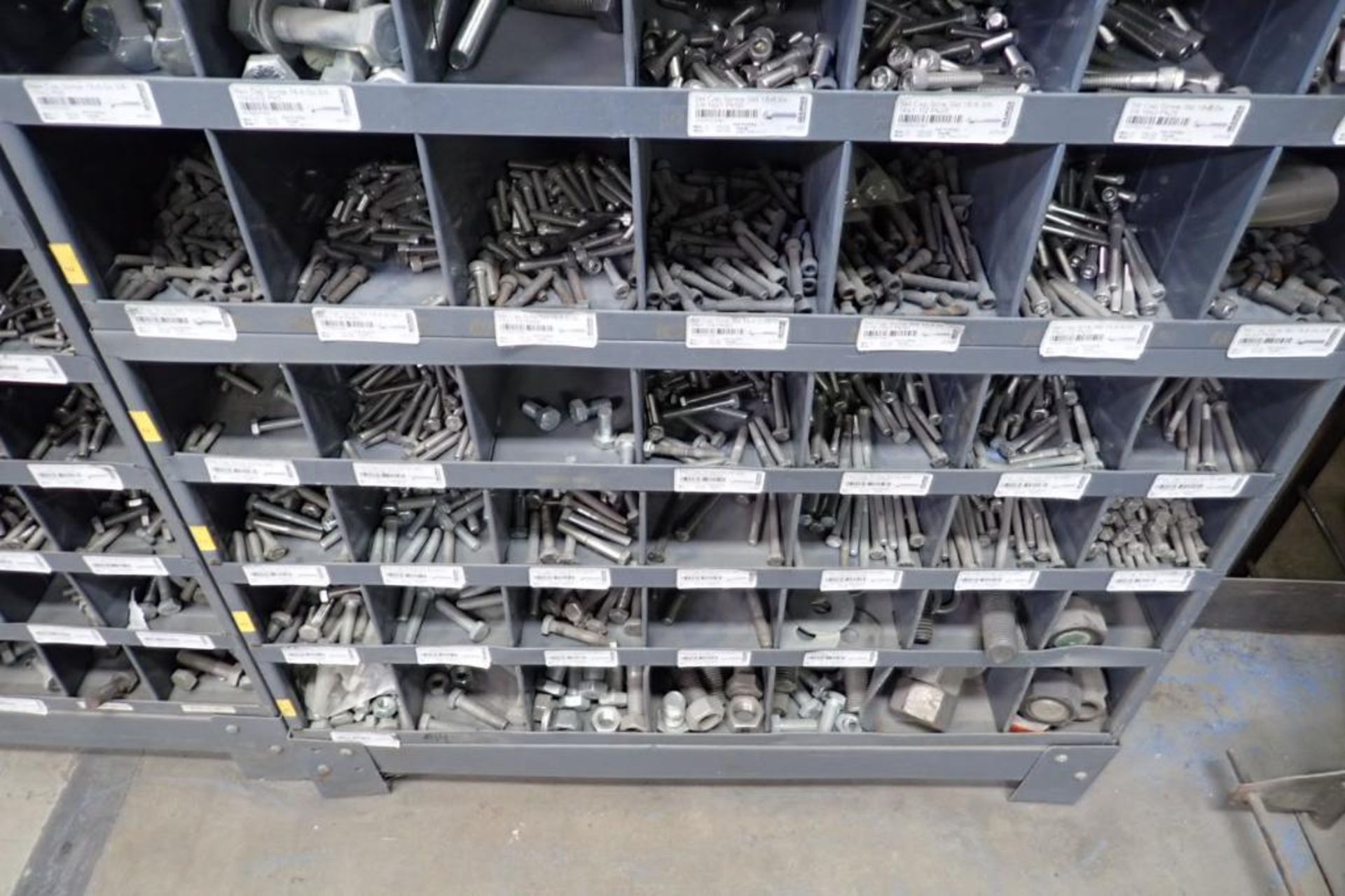 168 hole pigeon hole cabinets with contents, assorted bolts and nuts. **Rigging Fee: $150** (Located - Image 3 of 5