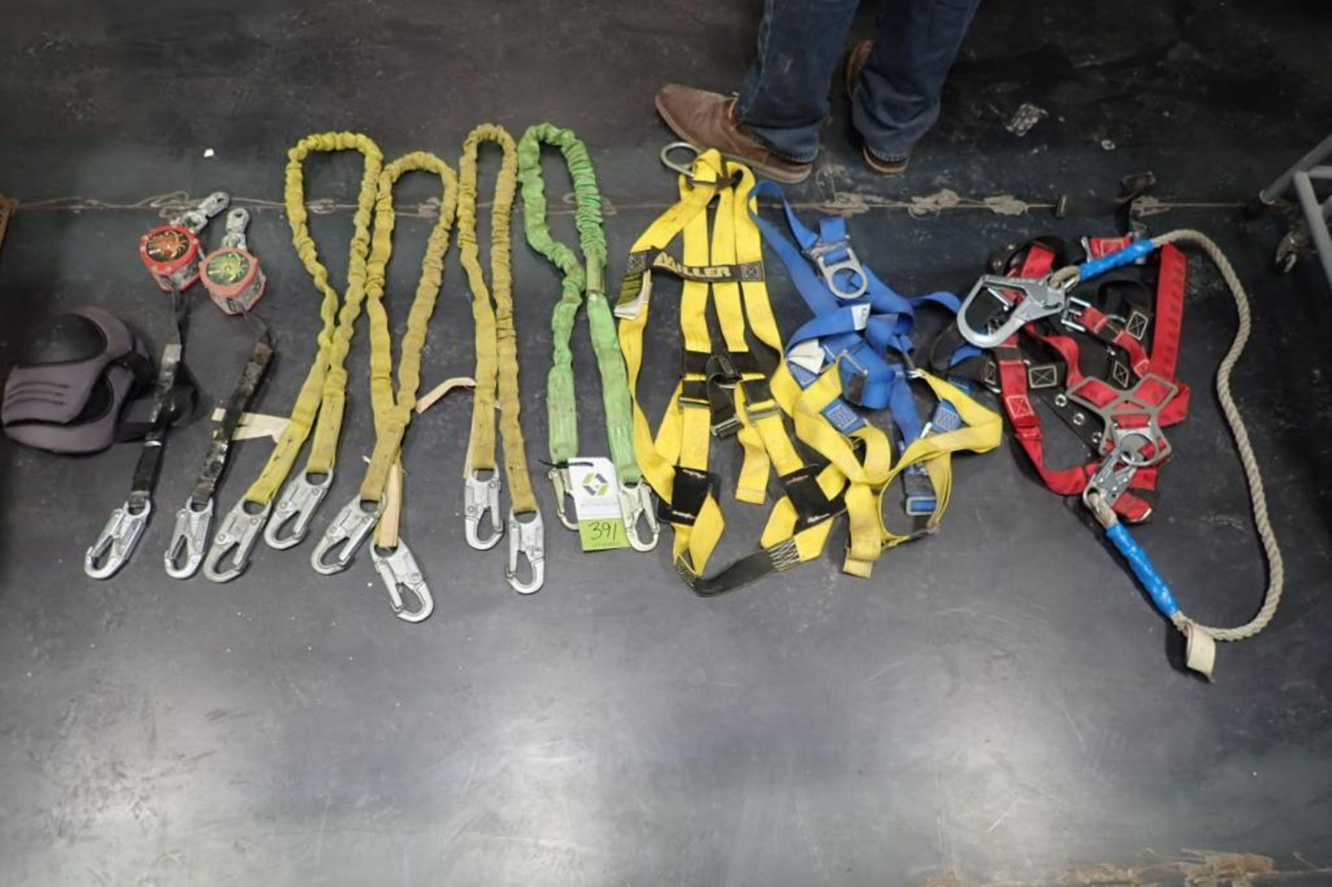 Assorted fall protection, harnesses, lanyards, retractable lanyards. **Rigging Fee: $15** (Located i