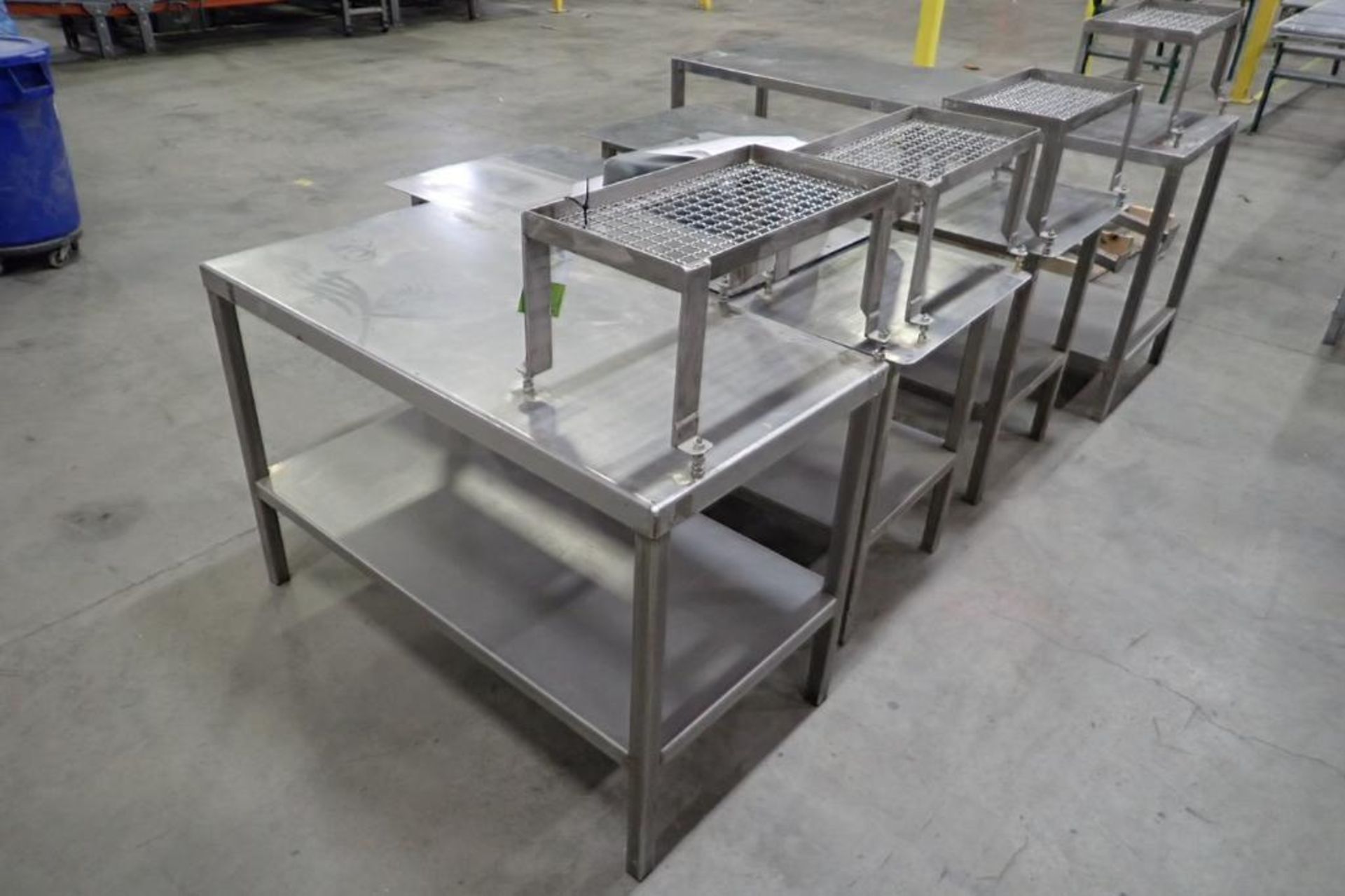 (4) SS assorted tables and (2) pedestal stands. **Rigging Fee: $100** (Located in Brooklyn Park, MN. - Image 6 of 7