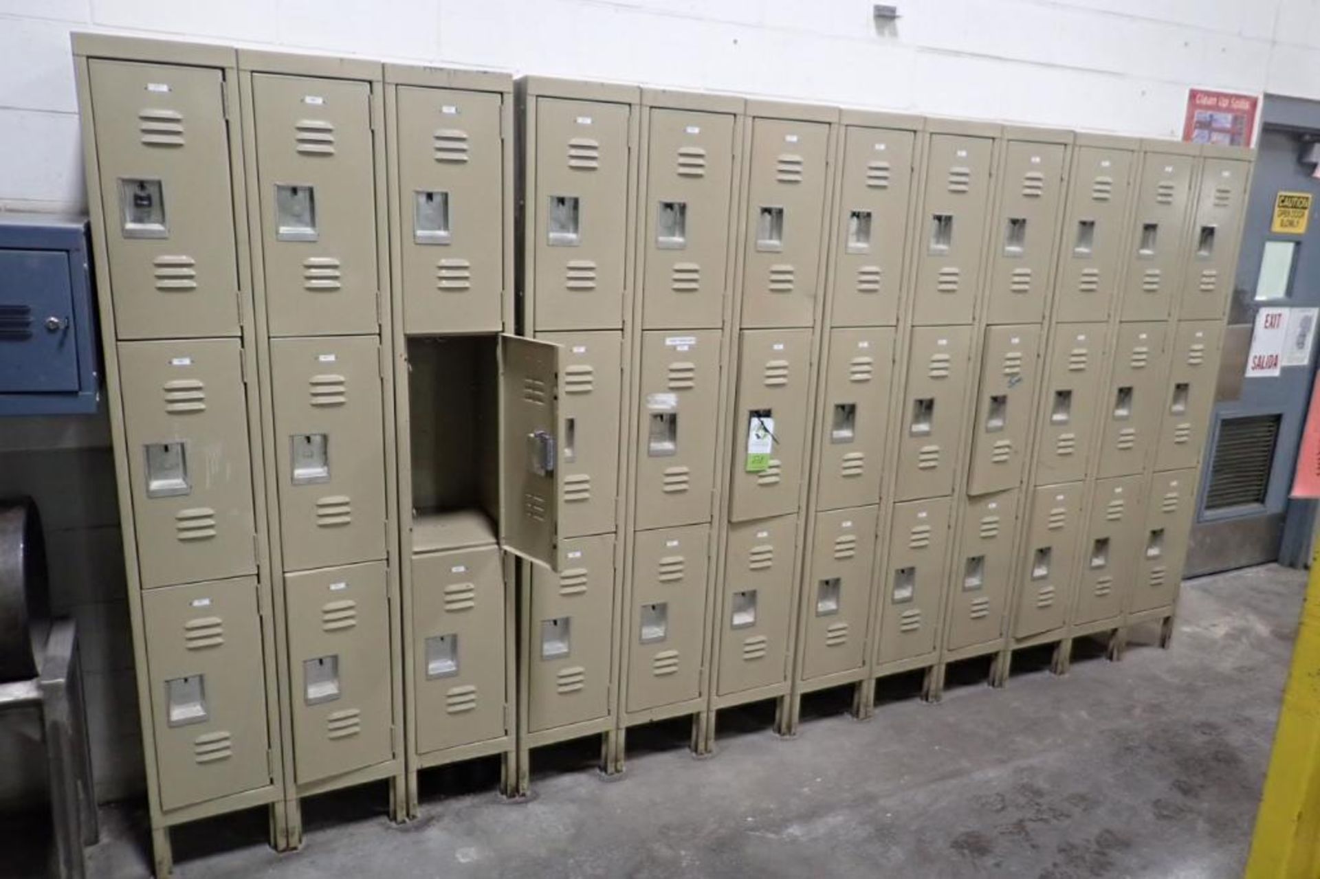 Employee lockers, (8) sections of 9 lockers, 10 in. wide x 14 in. deep x 23 in. tall per locker. **R