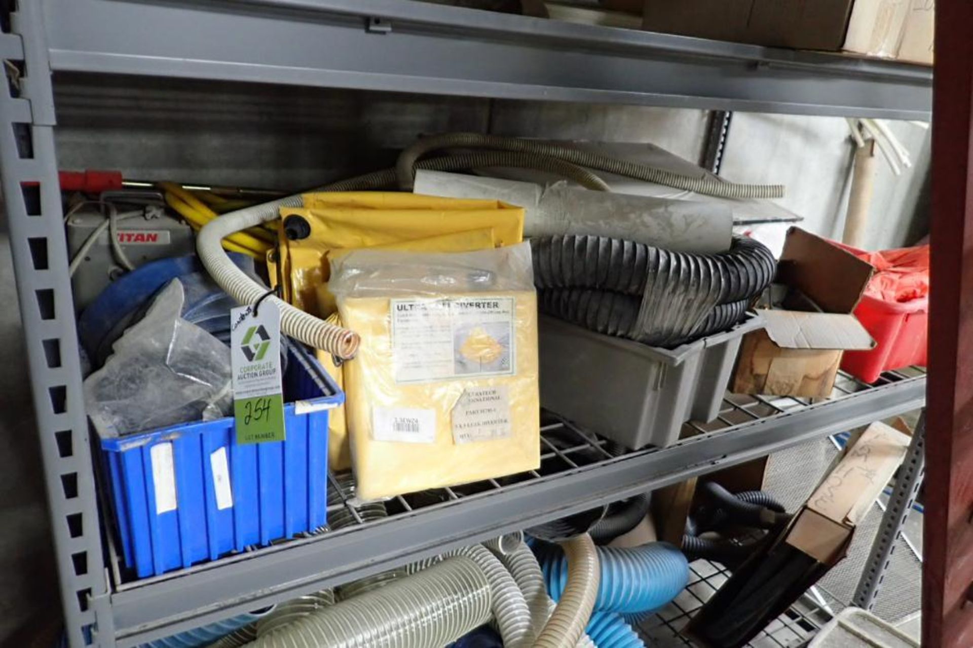 Contents of shelving, hose, drip diverter. **Rigging Fee: $100** (Located in Brooklyn Park, MN.) - Image 3 of 4