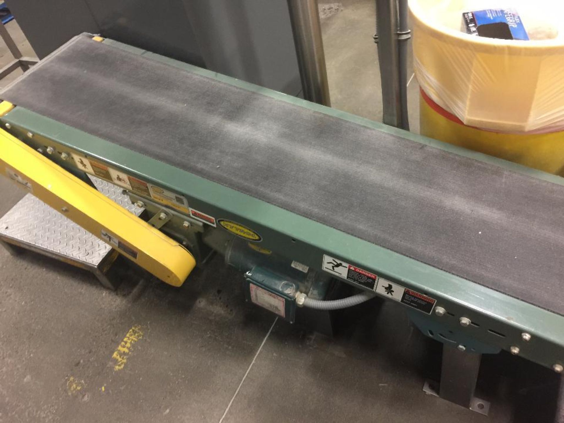 (2) Hytrol mild steel rubber belt conveyors, motor and drives.. **Rigging Fee: $150** (Located in Lo