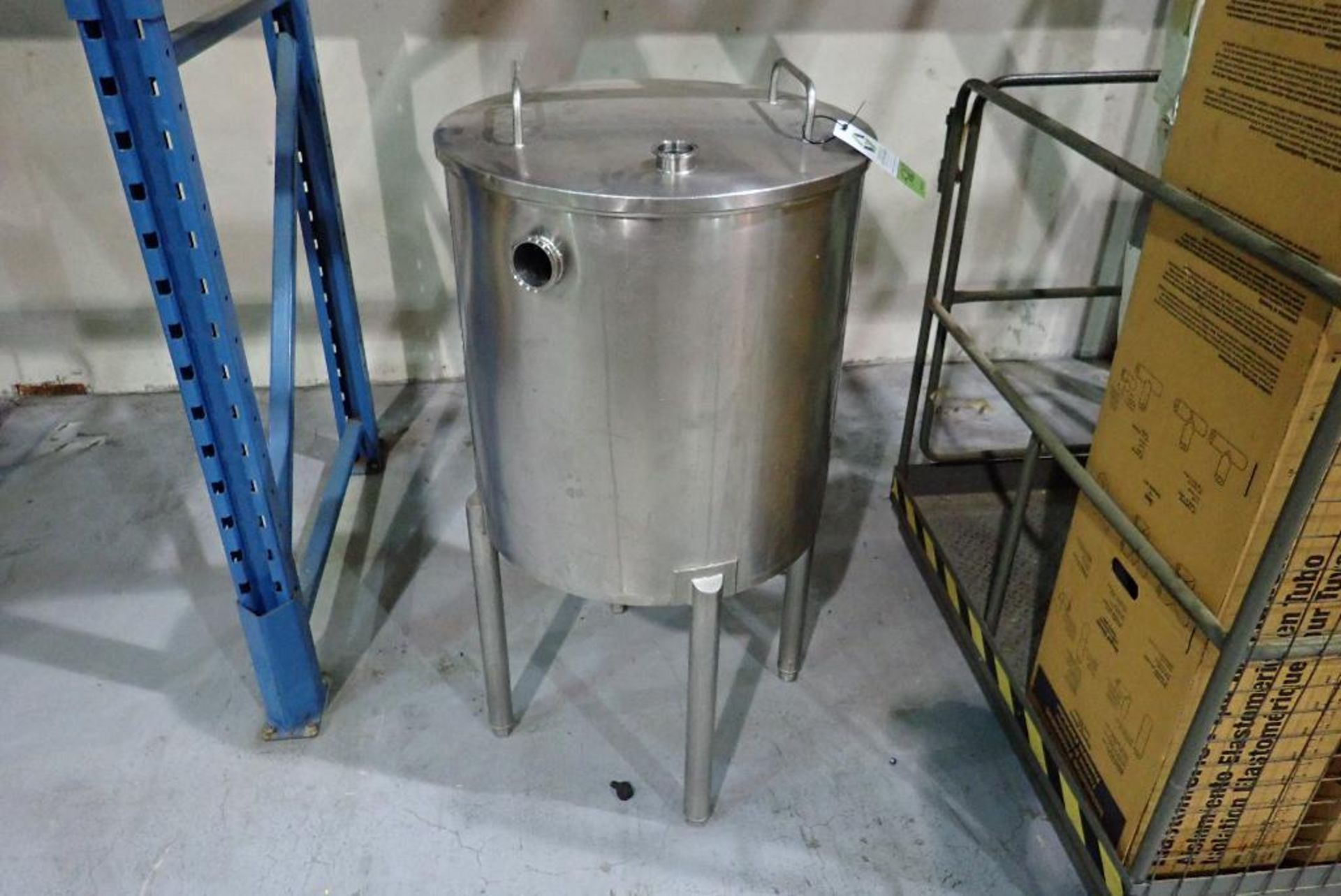 SS holding tank, 26 in. dia x 26 in. tall, cone bottom, 2 in. clamp cbo, with lid. **Rigging Fee: $1