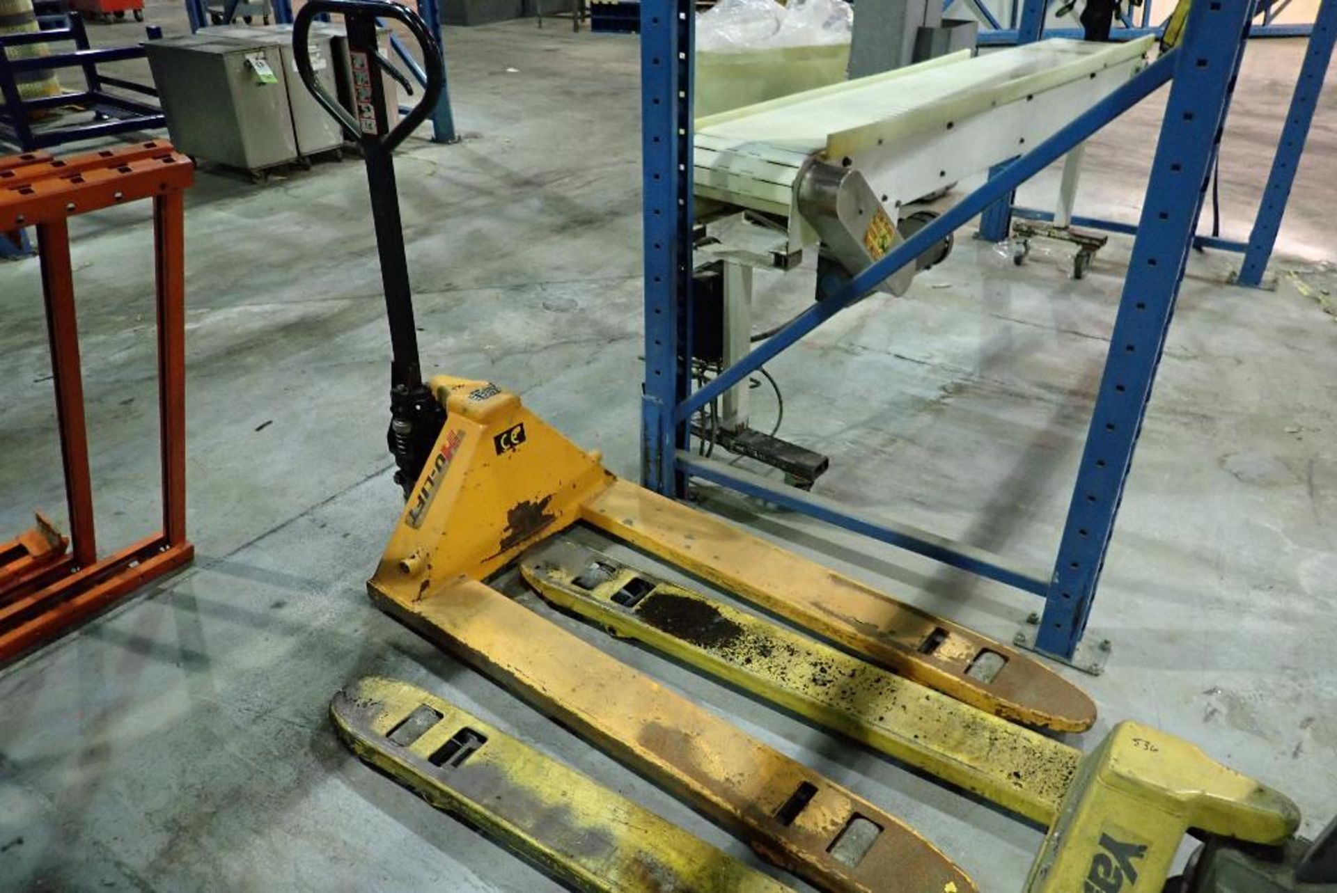 (2) hand pallet jacks, not working, one is missing pin in rear whel. **Rigging Fee: $15** (Located i - Image 4 of 5