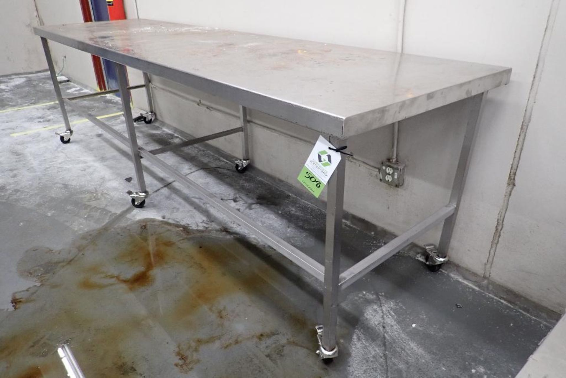 SS table, 120 in. long x 32 in. wide x 35 in. tall, on casters. **Rigging Fee: $75** (Located in Del - Image 2 of 2