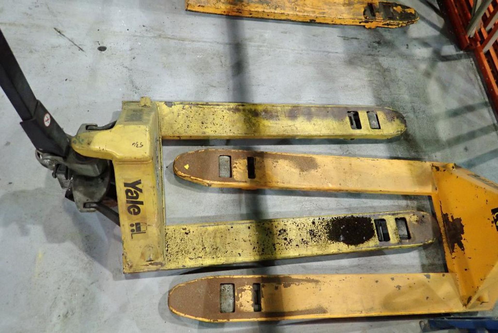 (2) hand pallet jacks, not working, one is missing pin in rear whel. **Rigging Fee: $15** (Located i - Image 2 of 5