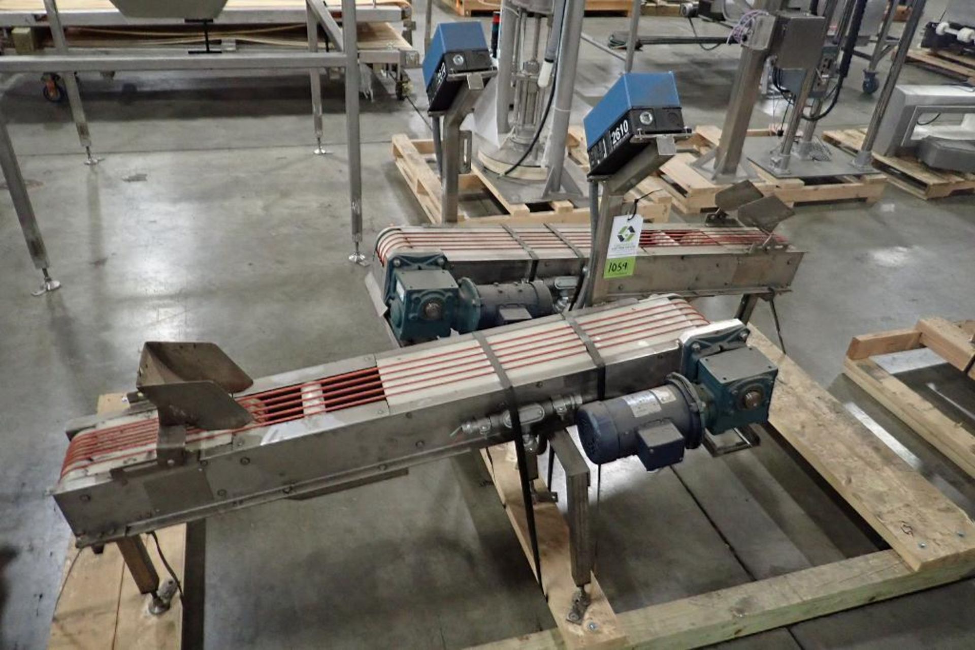 (2) incline band conveyors, 56 in. long x 6 in. wide x 19 in. infeed x 27 in. discharge, SS frame, m
