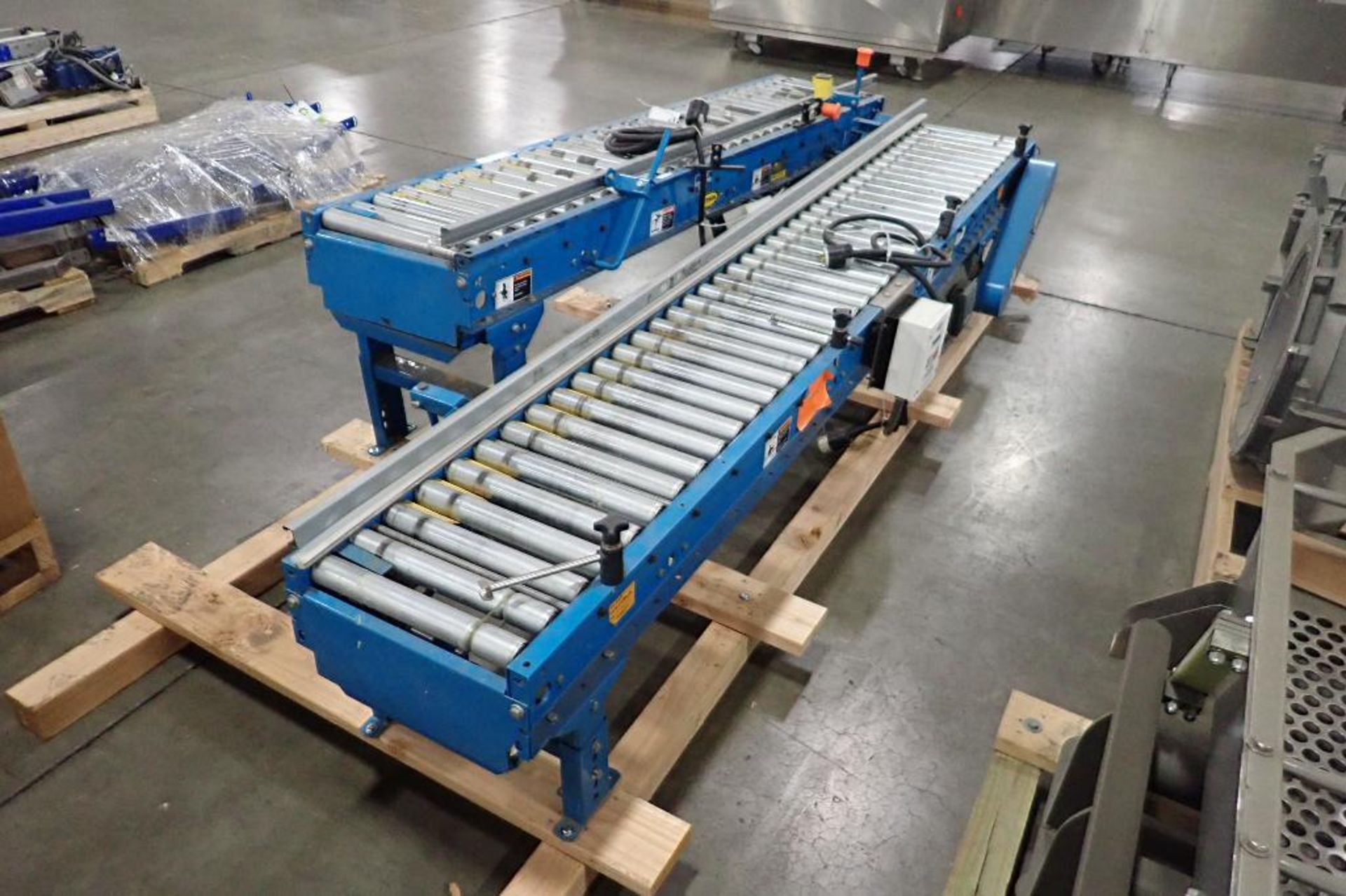 Skid of Hytrol powered roller conveyor, approx. 18 ft. long x 15 in. wide, motors and drives, speed