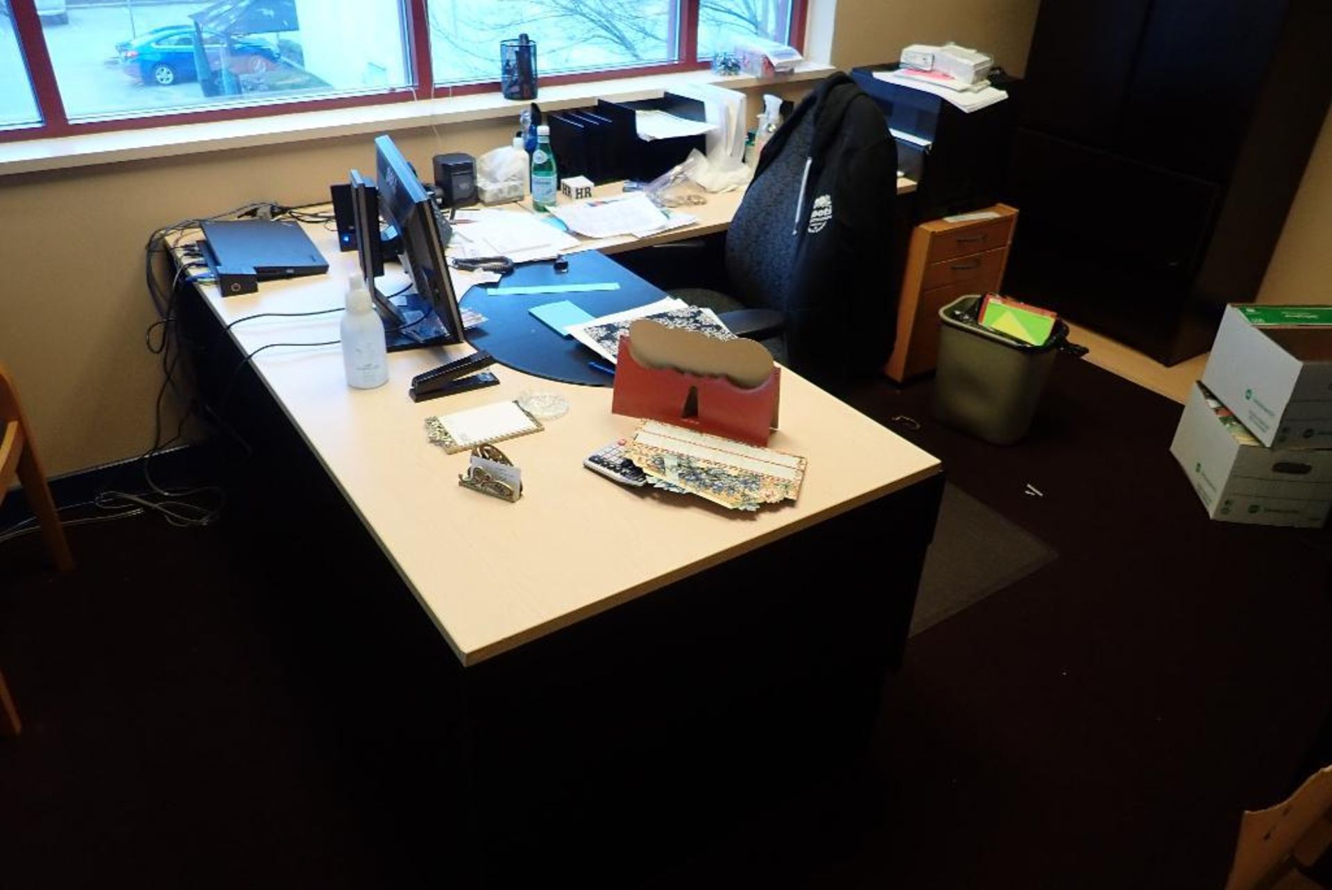Contents of office, desk, chair, cabinet. **Rigging Fee: $150** (Located in Delta, BC Canada.)