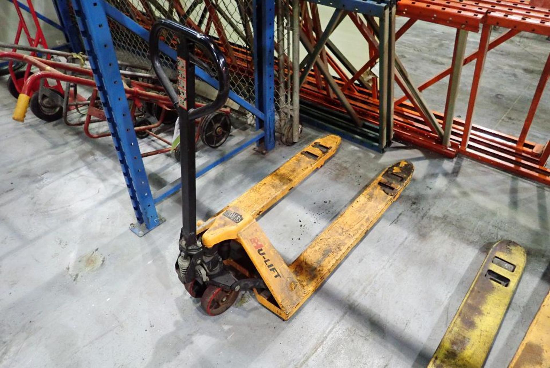 Hu-lift hand pallet jack, 5500 lbs. capacity. **Rigging Fee: $10** (Located in Delta, BC Canada.)