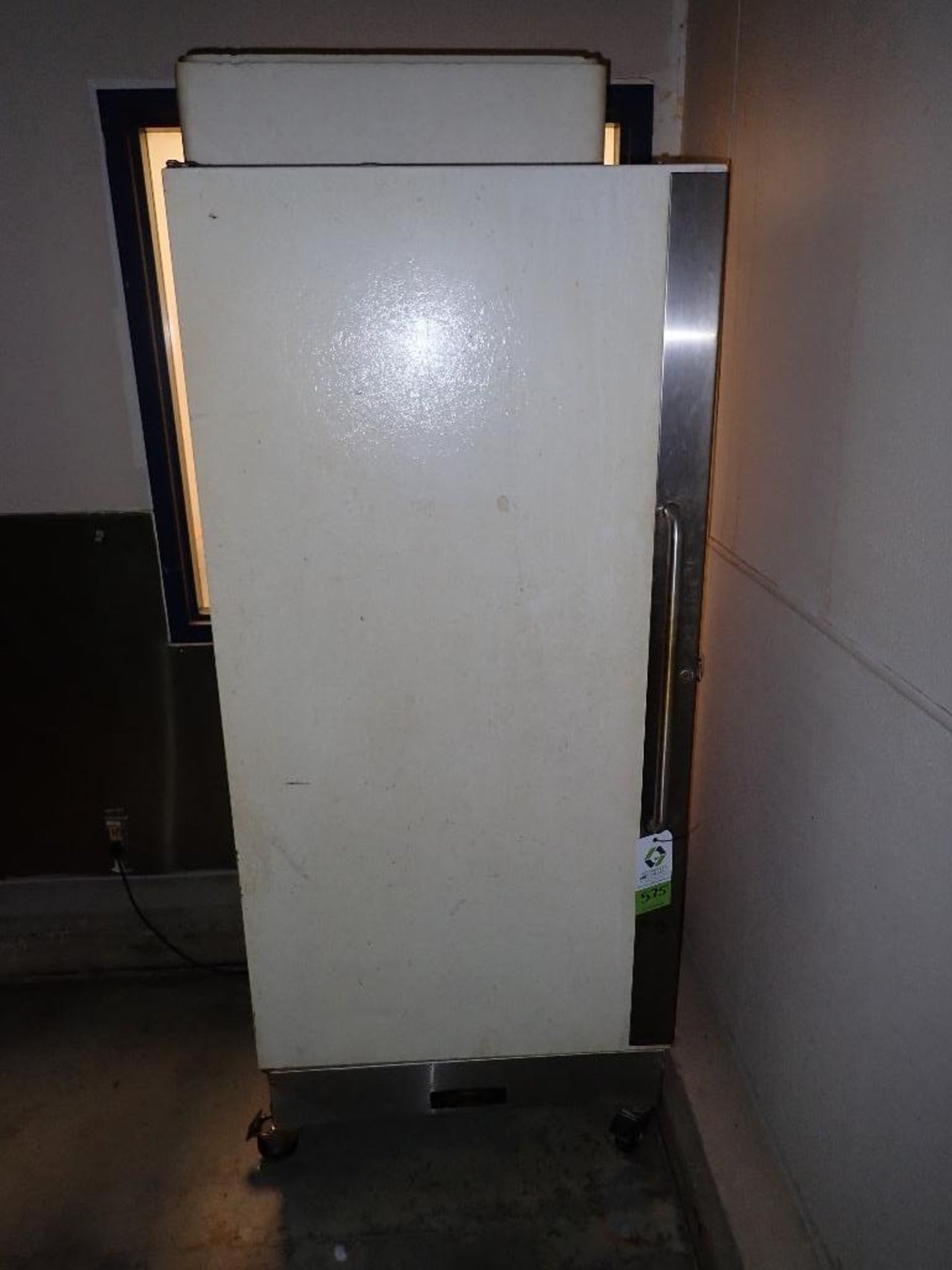 Arctic air single door freezer, 32 in. wide x 28 in. deep x 70 in. tall. **Rigging Fee: $50** (Locat