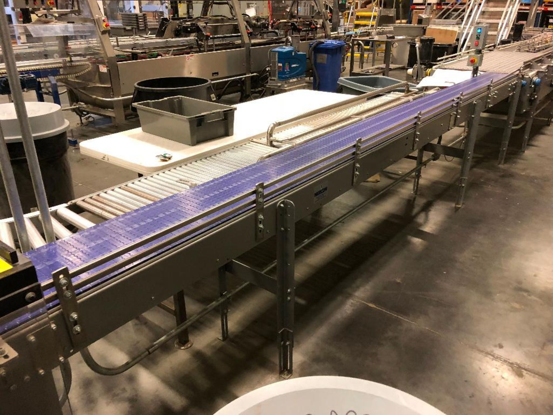 Nercon SS conveyor, 17 ft. x 12 in, blue plastic chain belt, motor and drive. **Rigging Fee: $200 **