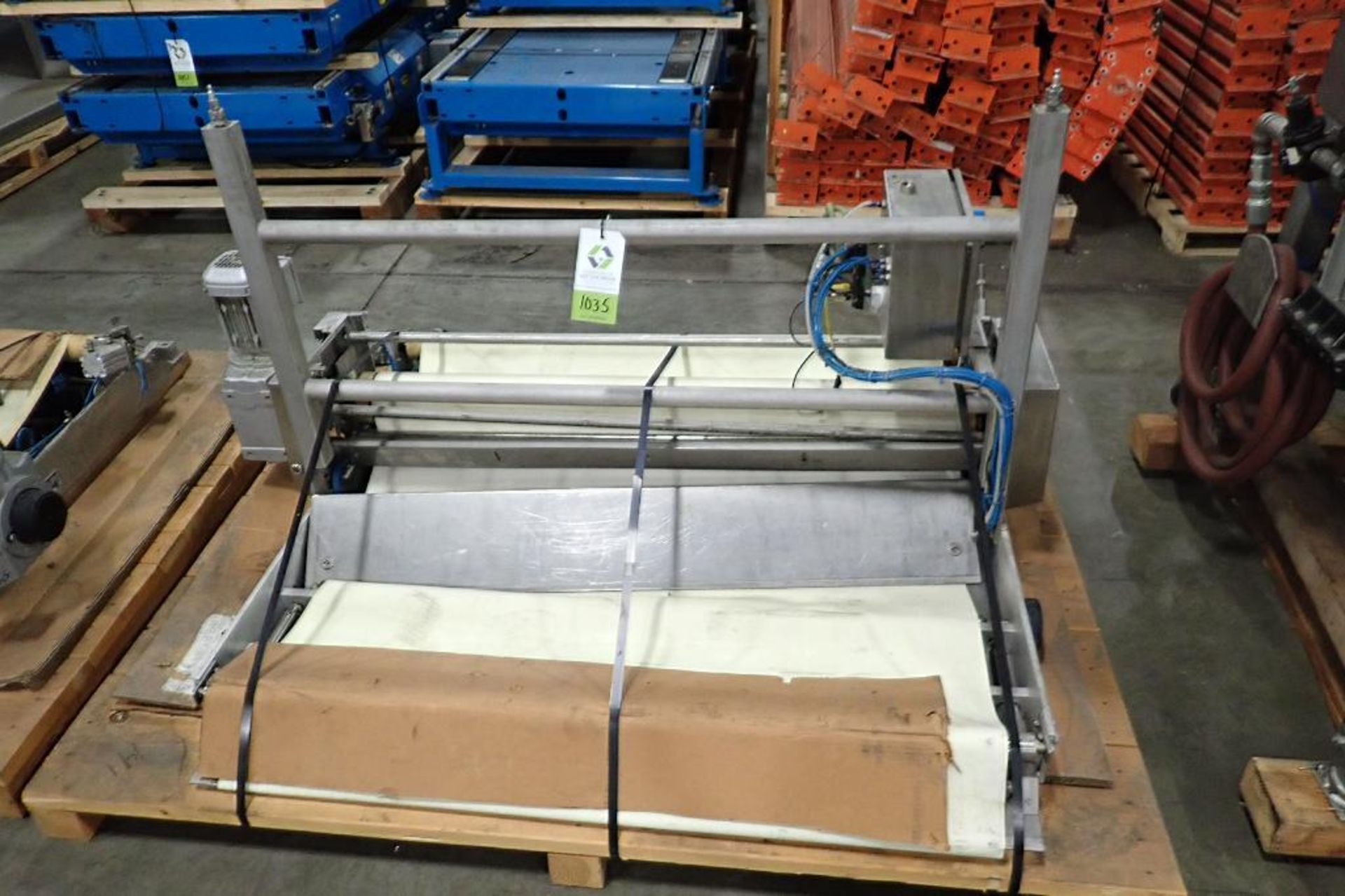 2011 Sollich transfer conveyor, 56 in. long x 51 in. wide, SS frame, motor and drive. **Rigging Fee: