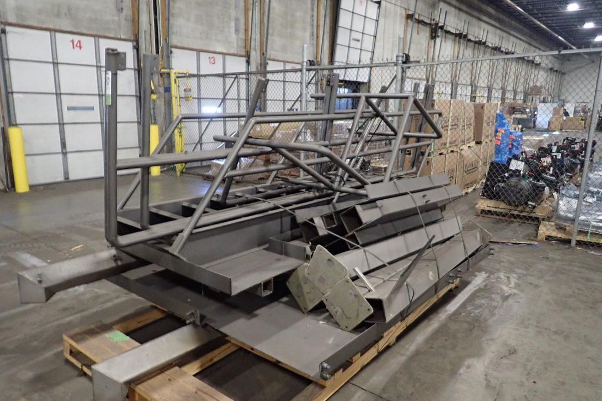 Skid of scale platform, mild steel deck, frame, stairs, SS legs (LOT). **Rigging Fee: $200** (Locate