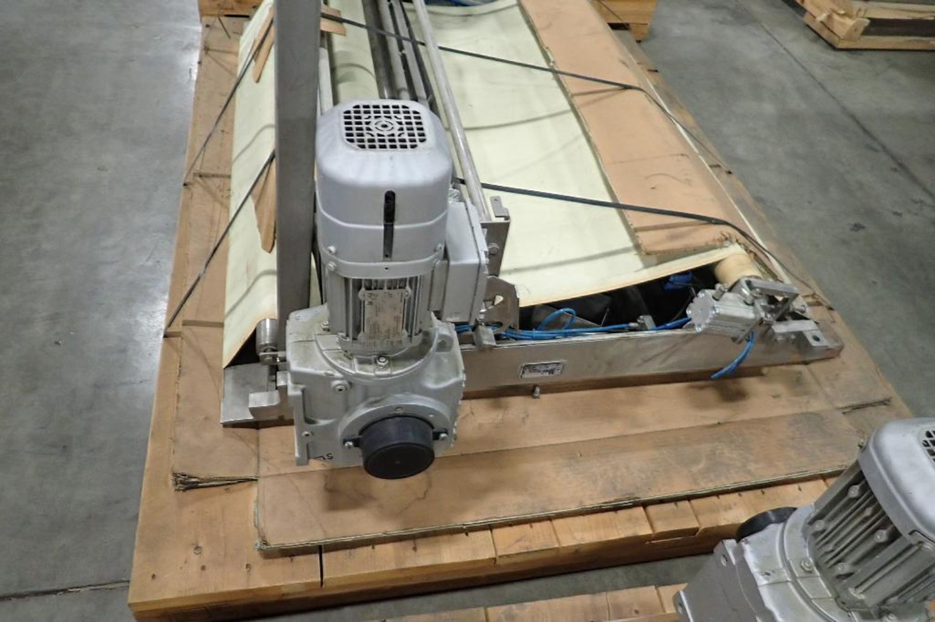 Transfer conveyor, 56 in. long x 51 in. wide, SS frame, motor and drive. **Rigging Fee: $25** (Locat - Image 3 of 9