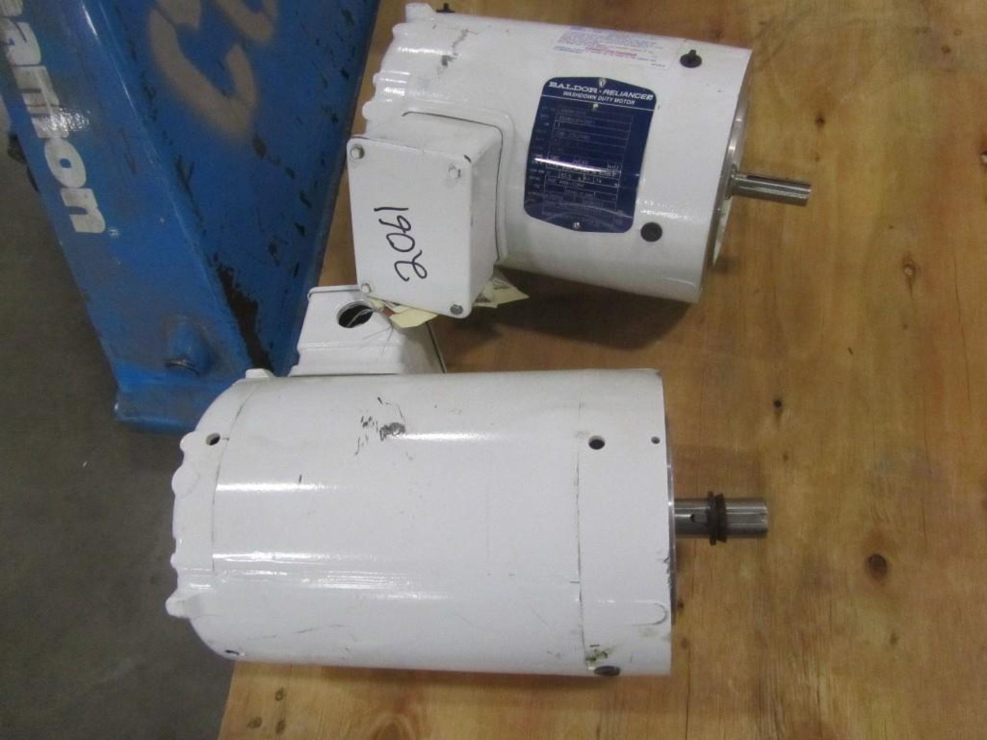 (2) New Baldor electric washdown motors, 1 hp and 1.5 hp. (See photos for additional specs). **Riggi