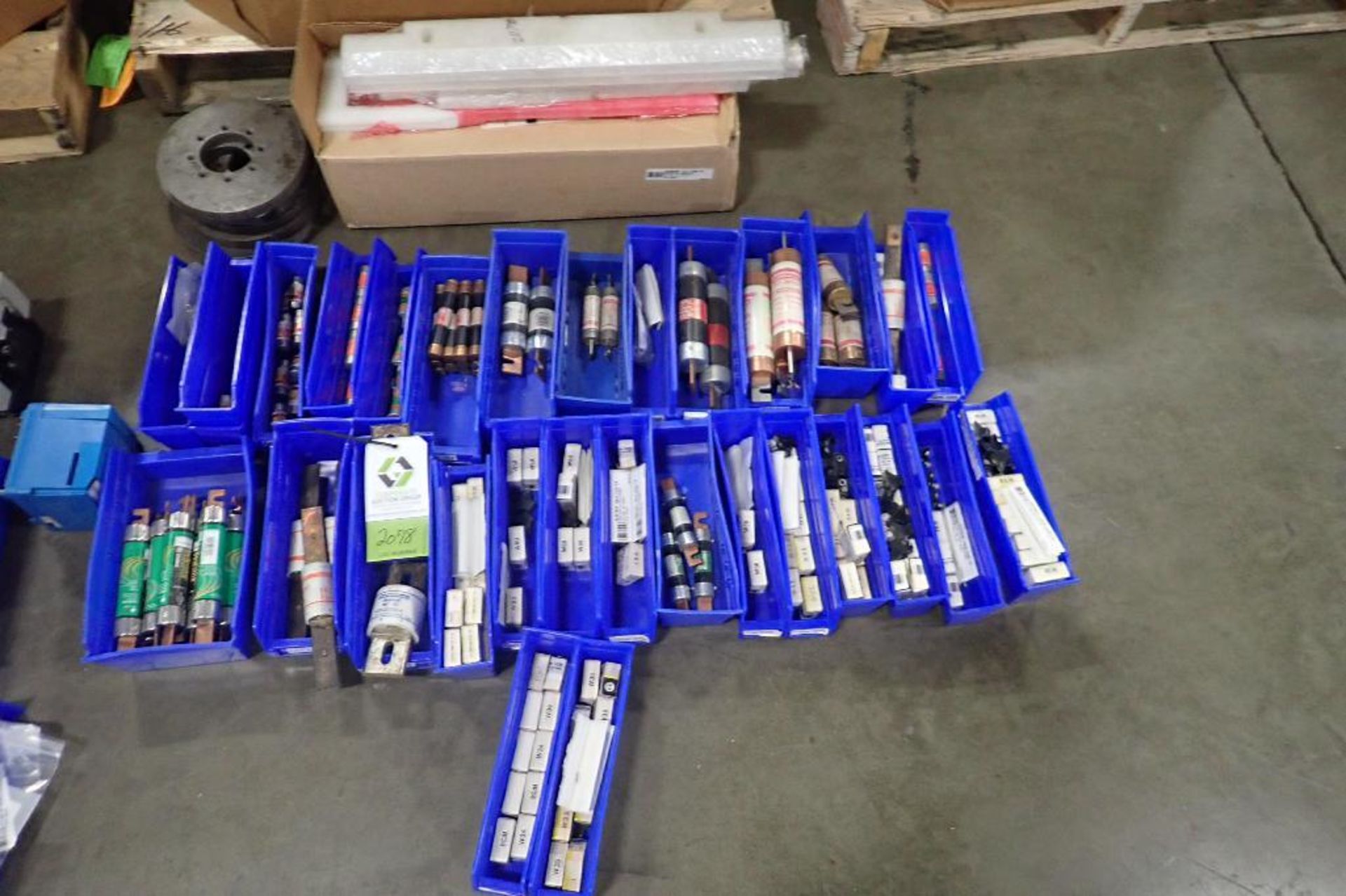 (2) skids of parts, fuses, oven parts, taper parts. (See photos for additional specs). **Rigging Fee