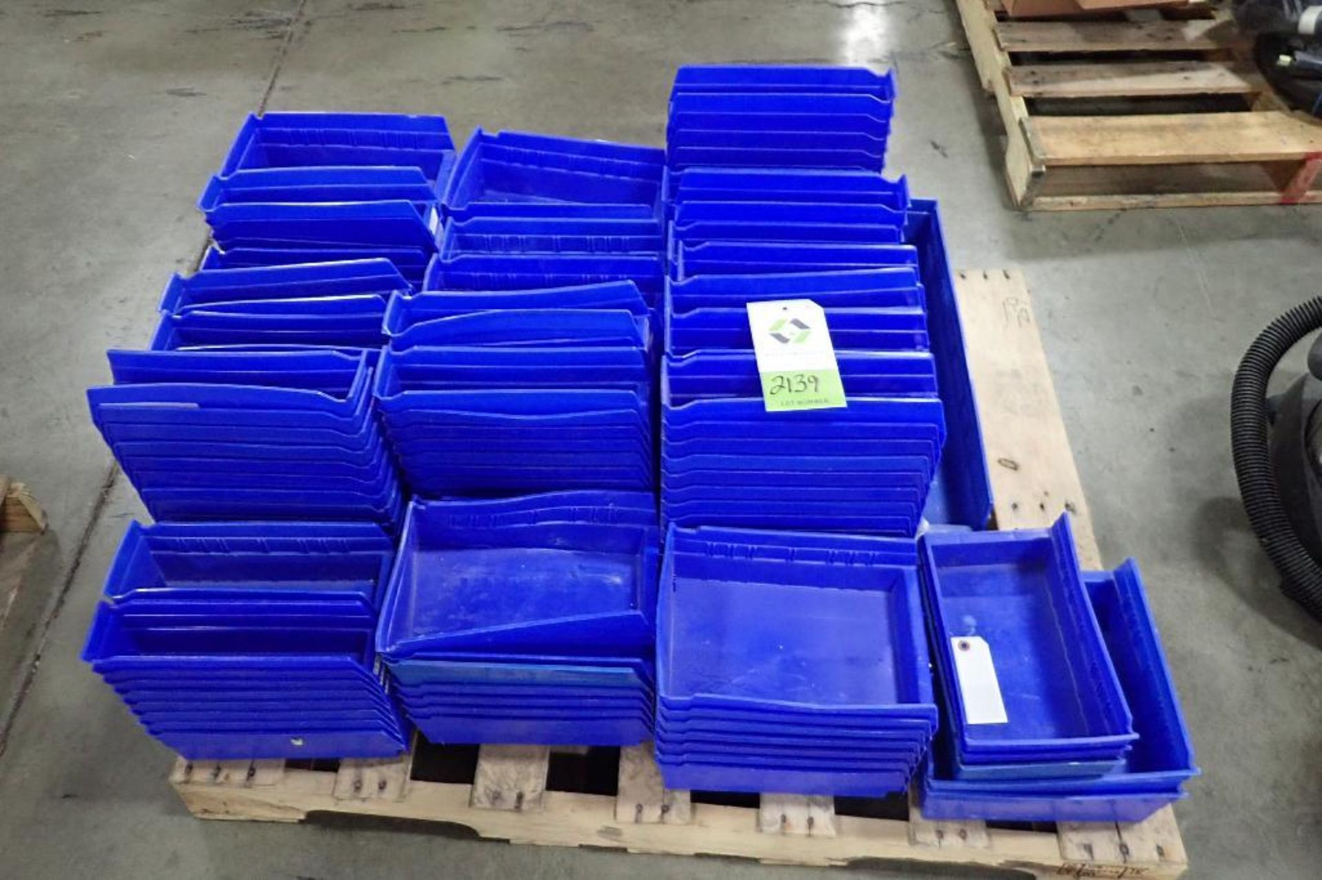 Pallet of blue stackable parts bins, approx. 250. (See photos for additional specs). **Rigging Fee: