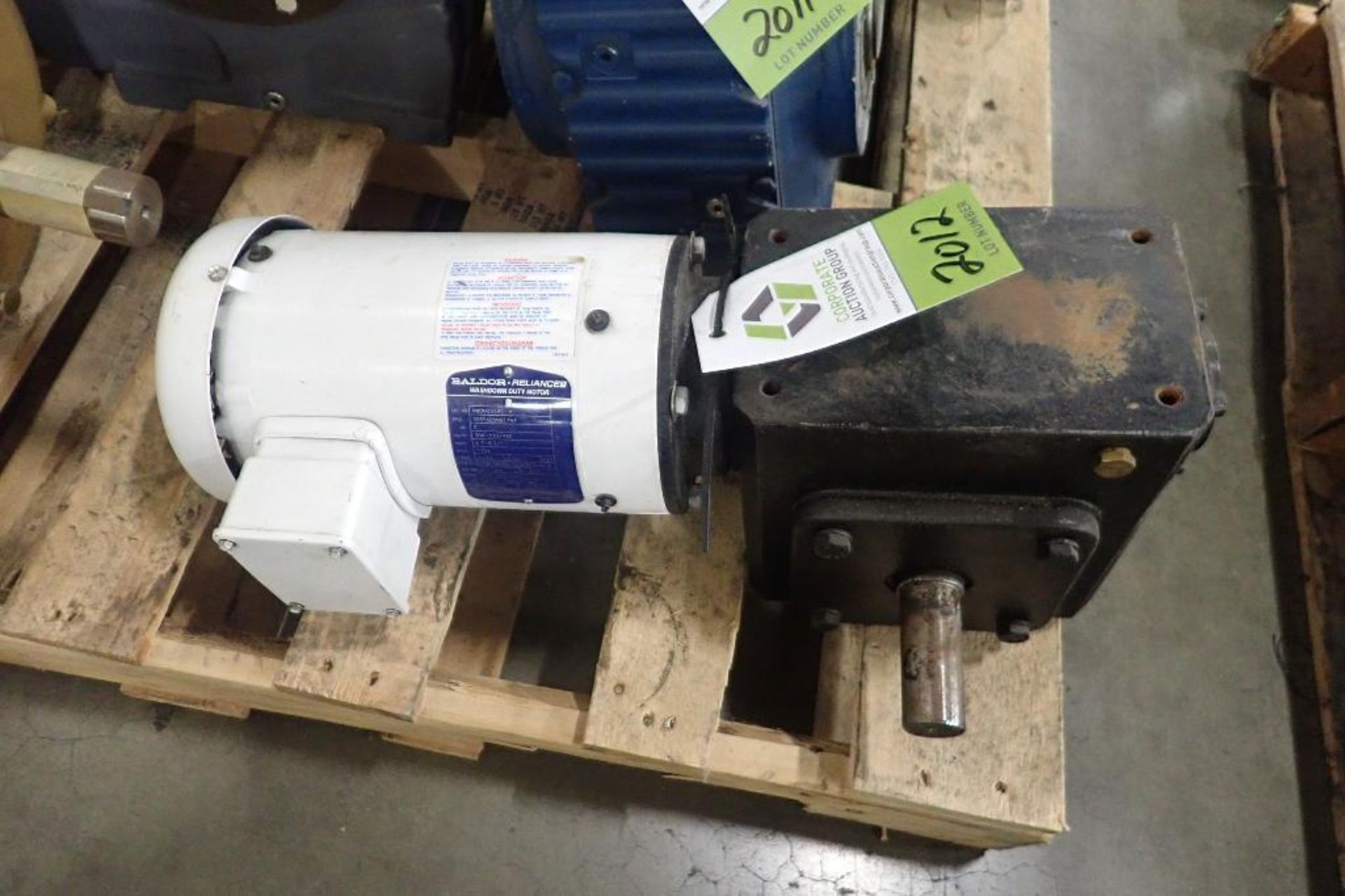 Baldor 2 hp electric motor and gearbox. (See photos for additional specs). **Rigging Fee: $25** (Loc