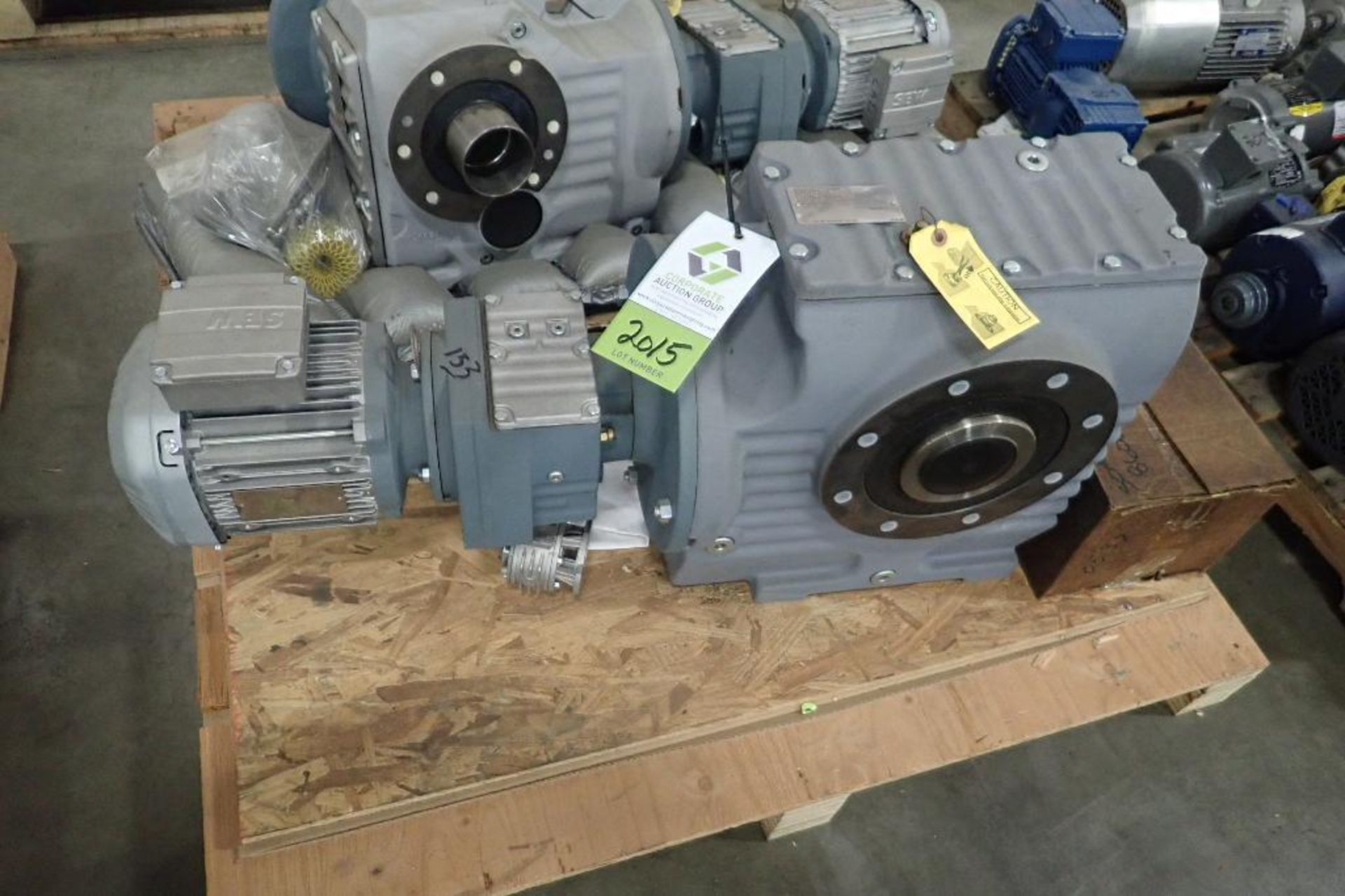 SEW 1.5 hp electric motor and gearbox. (See photos for additional specs). **Rigging Fee: $25** (Loca