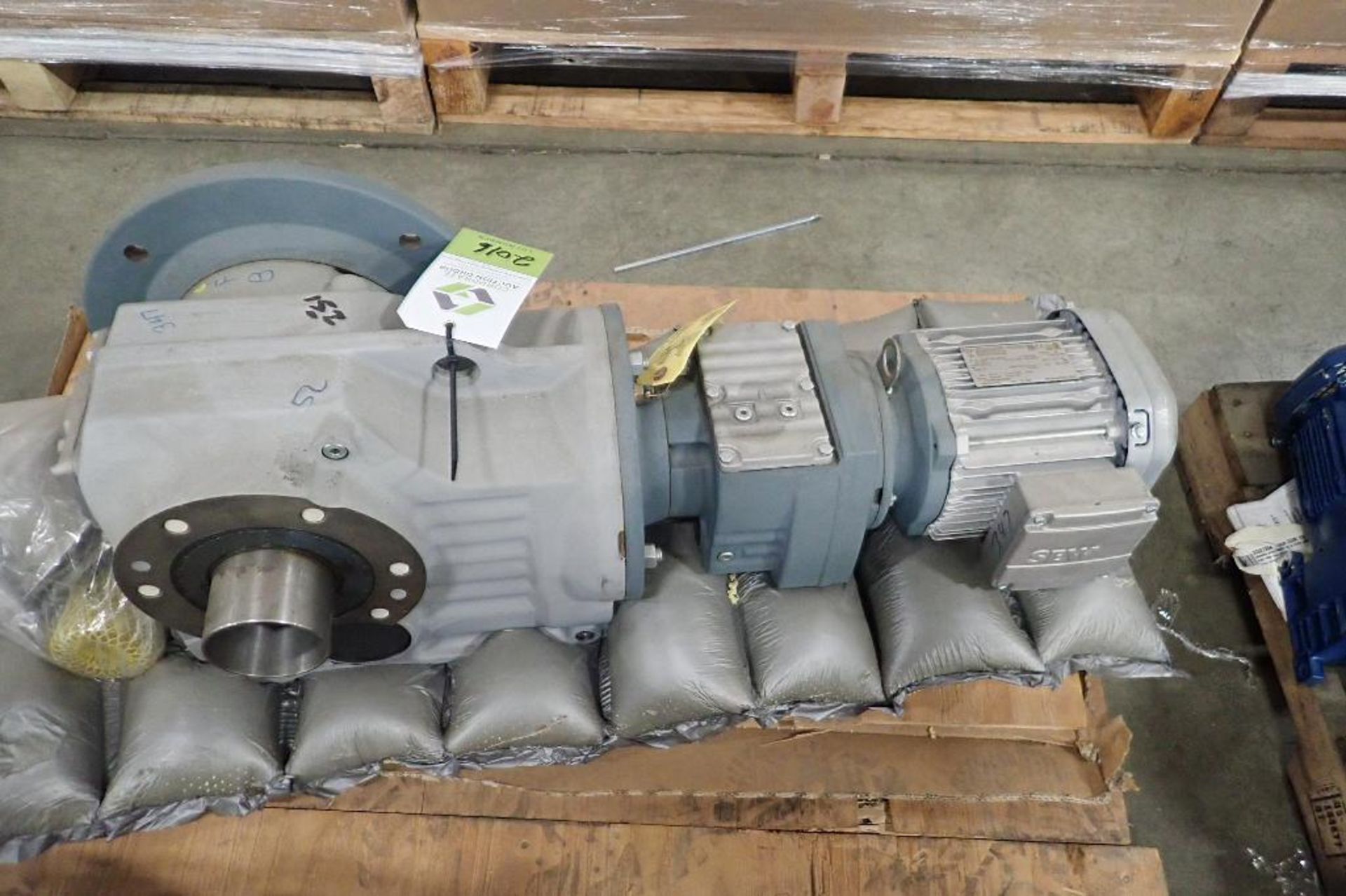 SEW 1.5 hp electric motor and gearbox. (See photos for additional specs). **Rigging Fee: $25** (Loca