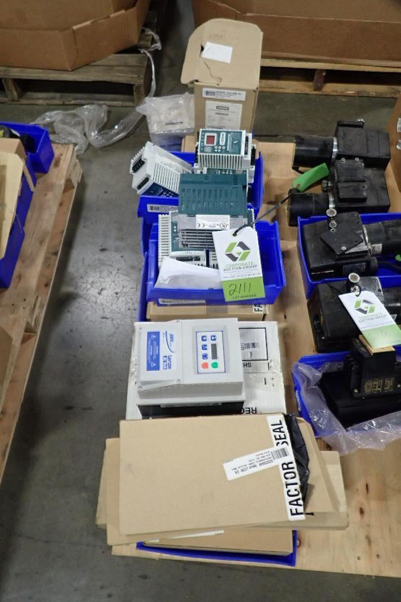 Lot of Leeson speed controllers, Allen Bradley parts, Acme transformer. (See photos for additional s
