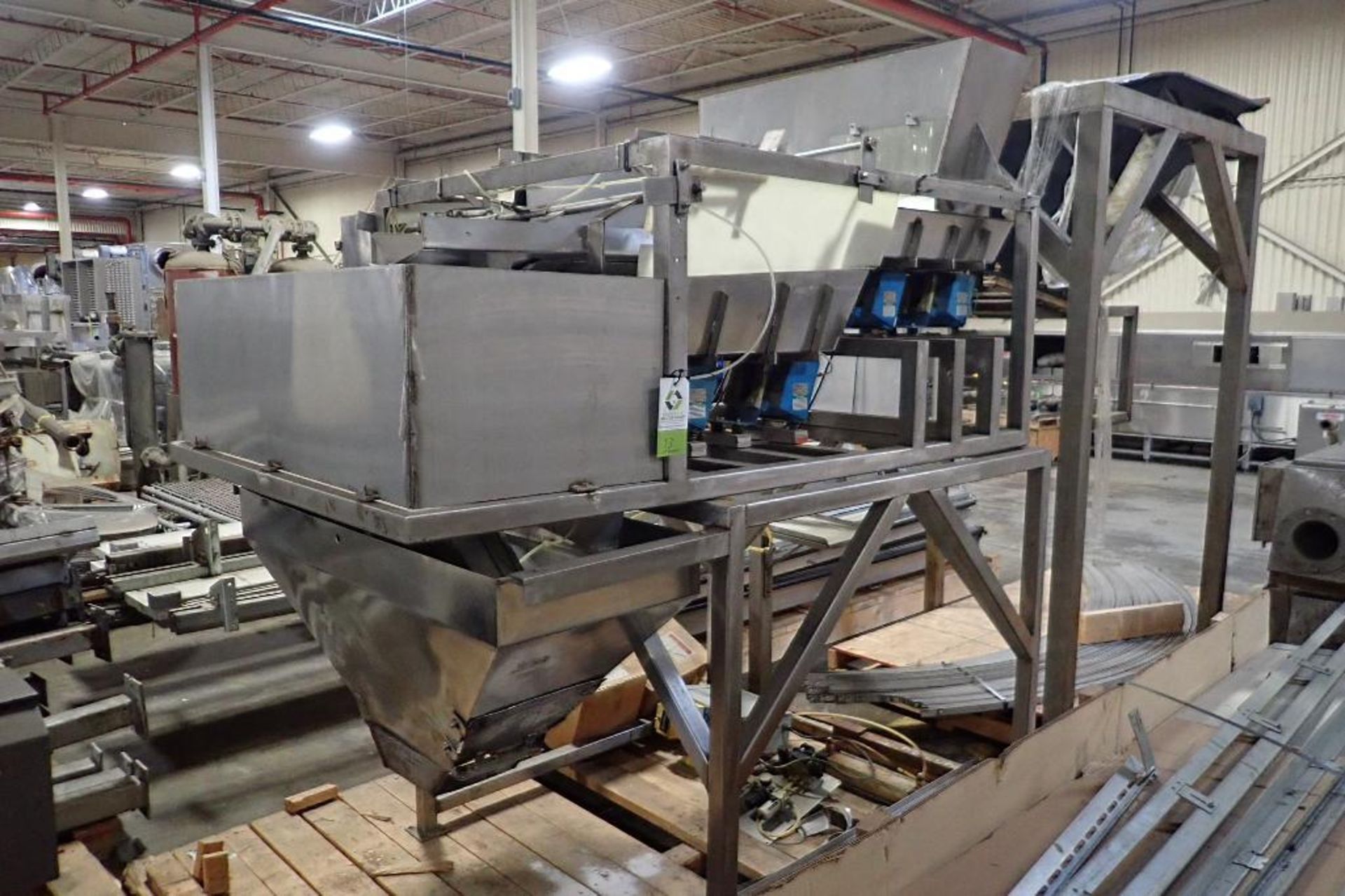 Ohlson 2 lane scale, Model 462-D3-50-10P1, SN 1633930H, with SS vibratory feeders, SS frame, **Riggi