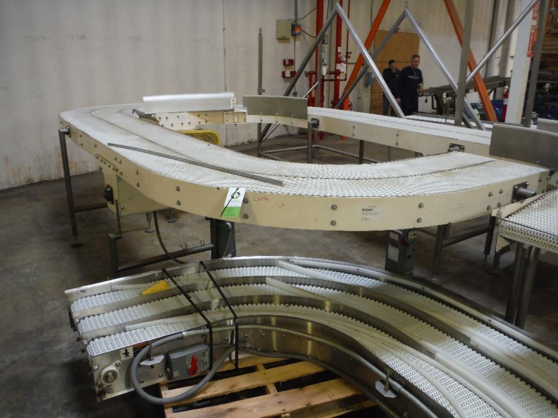 180 degree dual lane conveyor, 11.5 in. wide each, overall 192 in. long x 46 in. tall, carbon steel