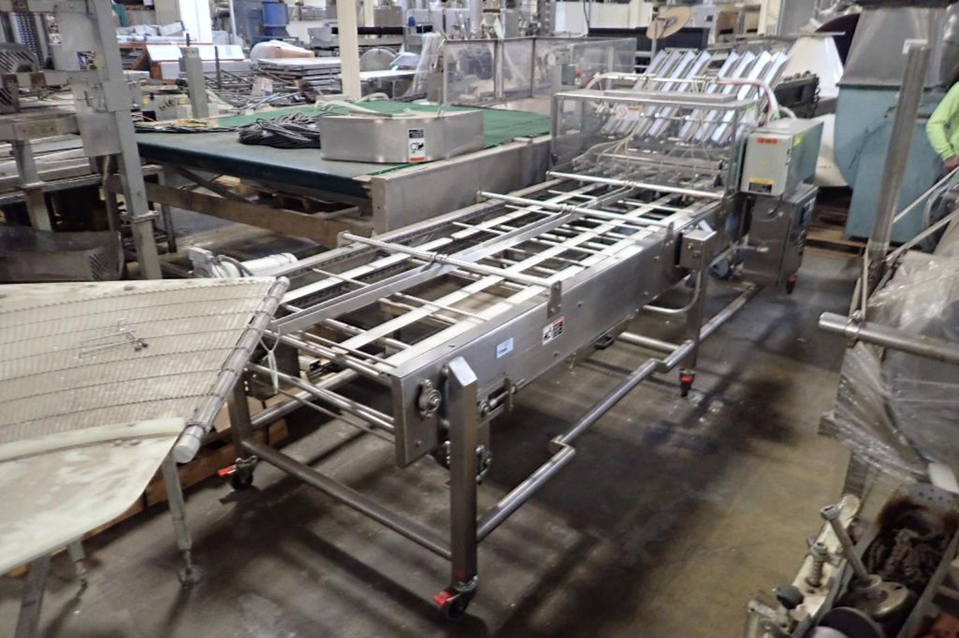 2002 Thiele reciprocating placer, SN T7300A281, 8 lane, Fedco table, Model C0.40.16, SN 201084, SS f