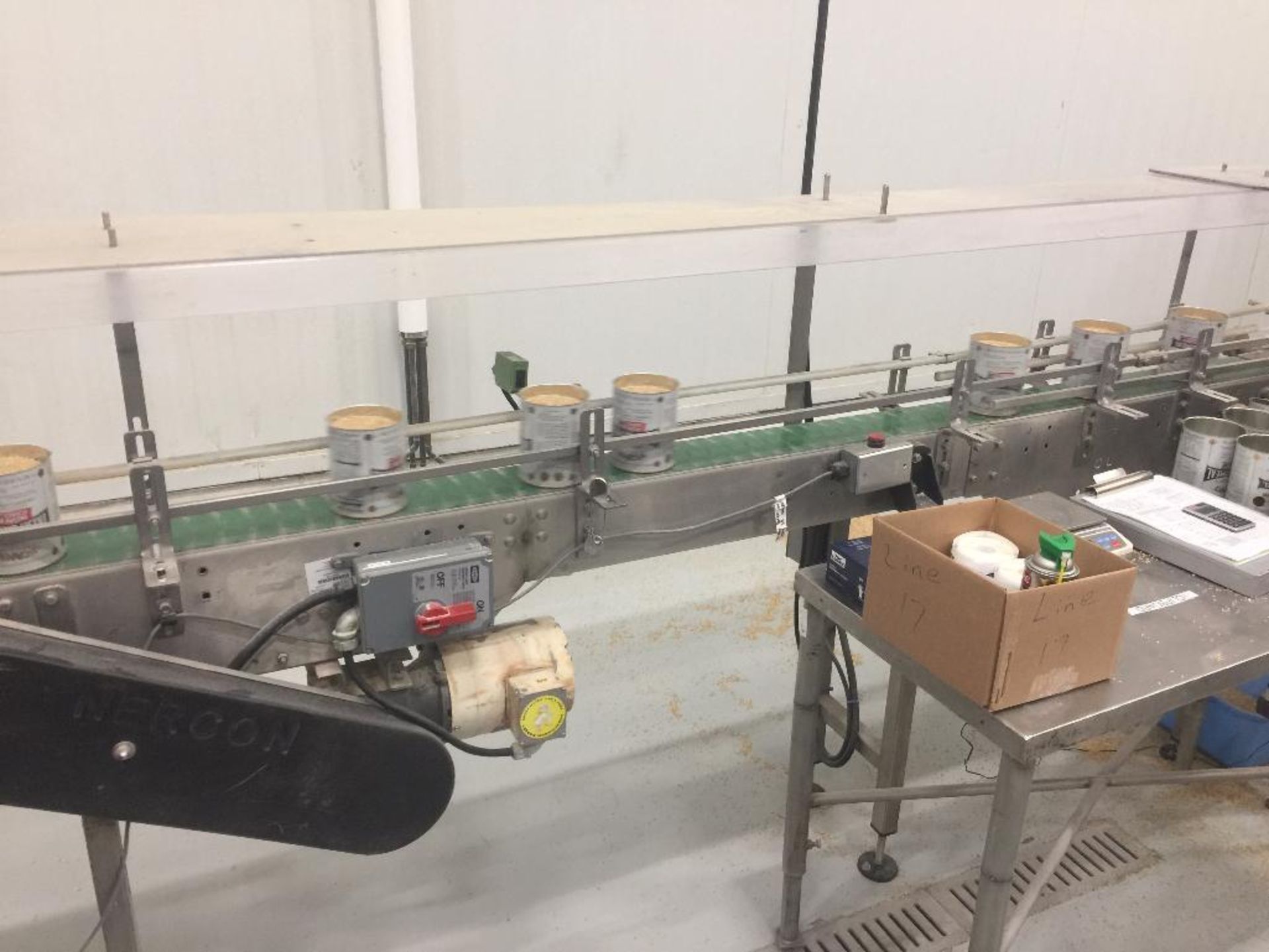 SS conveyor, 120 in. x 4 1/2 in. table top chain belt, motor and drive. - ** Located in Medina, New